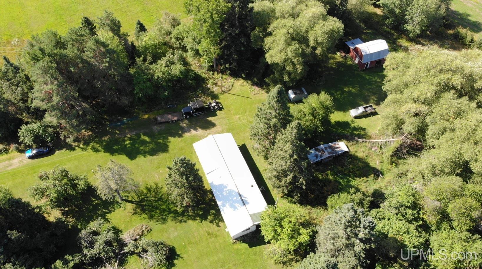 Photo 1 of Single family home for sale at 24423 Clayco Rd, Pelkie, MI 49958 | MLS# 50222591 | Listing updated on 2026-09-22