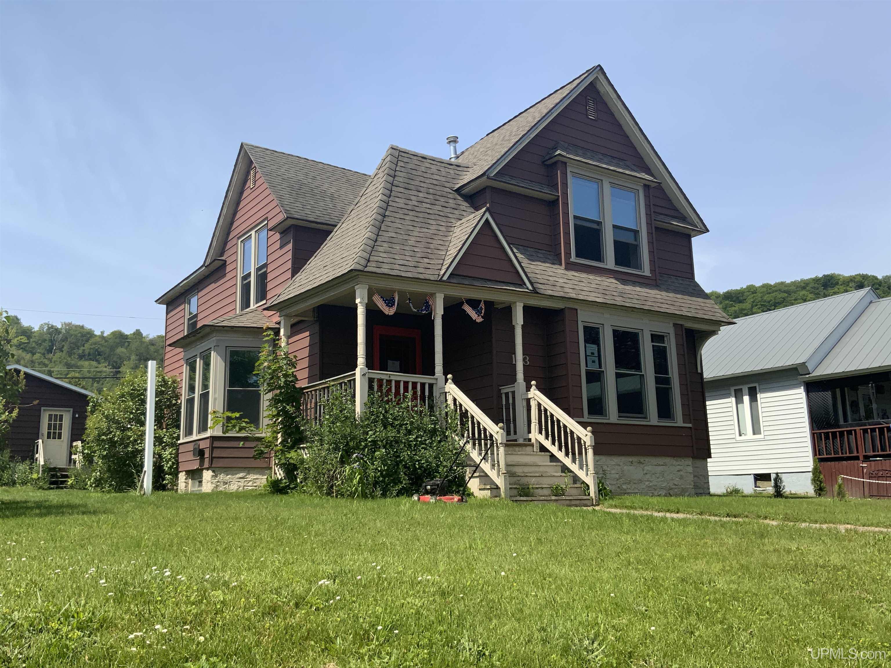 Single family home for sale at 113 W Onota St, Munising, MI 49862 | MLS# 50222757
