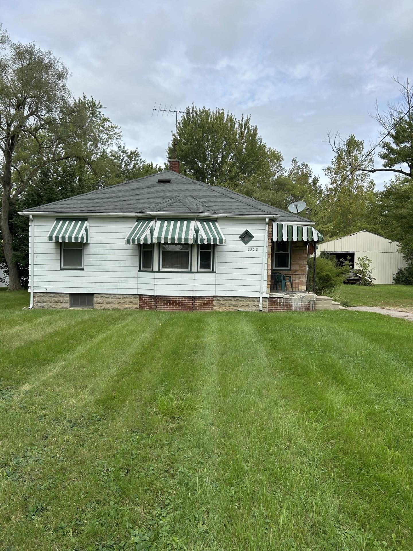 Photo 1 of Single family home for sale at 6302 Corunna Rd, Flint, MI 48532 | MLS# 5050222942 | Listing updated on 2026-09-25