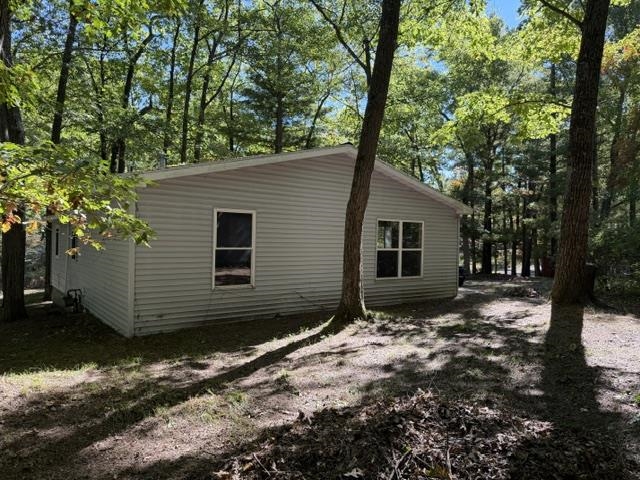 Photo 3 of Single family home for sale at 302 Wilson Ave, Harrison, MI 48625 | MLS# 50223132 | Listing updated on 2026-10-02