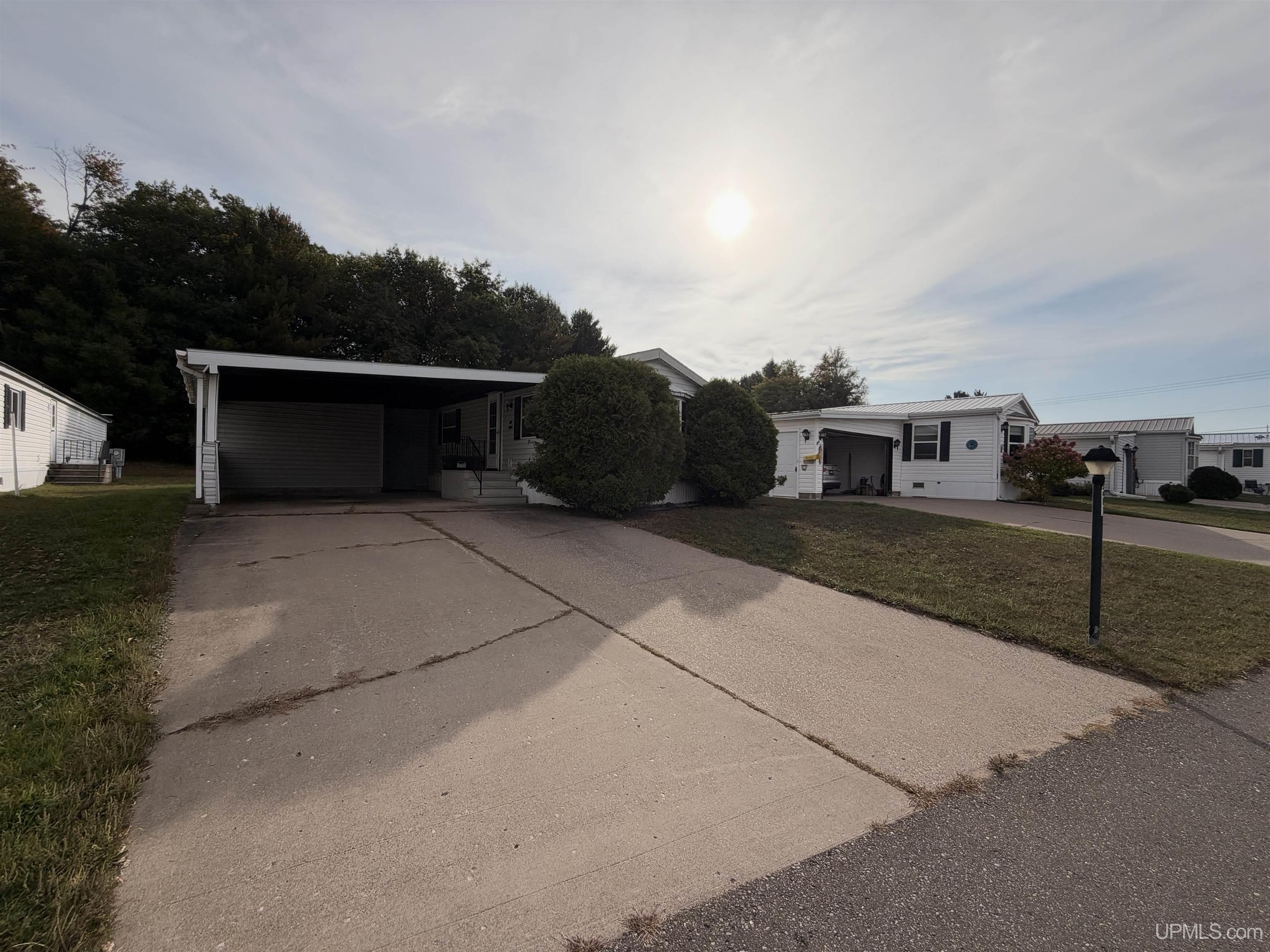 Photo 1 of Manufactured home for sale at W8007 Us 141/2 Hwy, Iron Mountain, MI 49801 | MLS# 50223303 | Listing updated on 2026-09-29