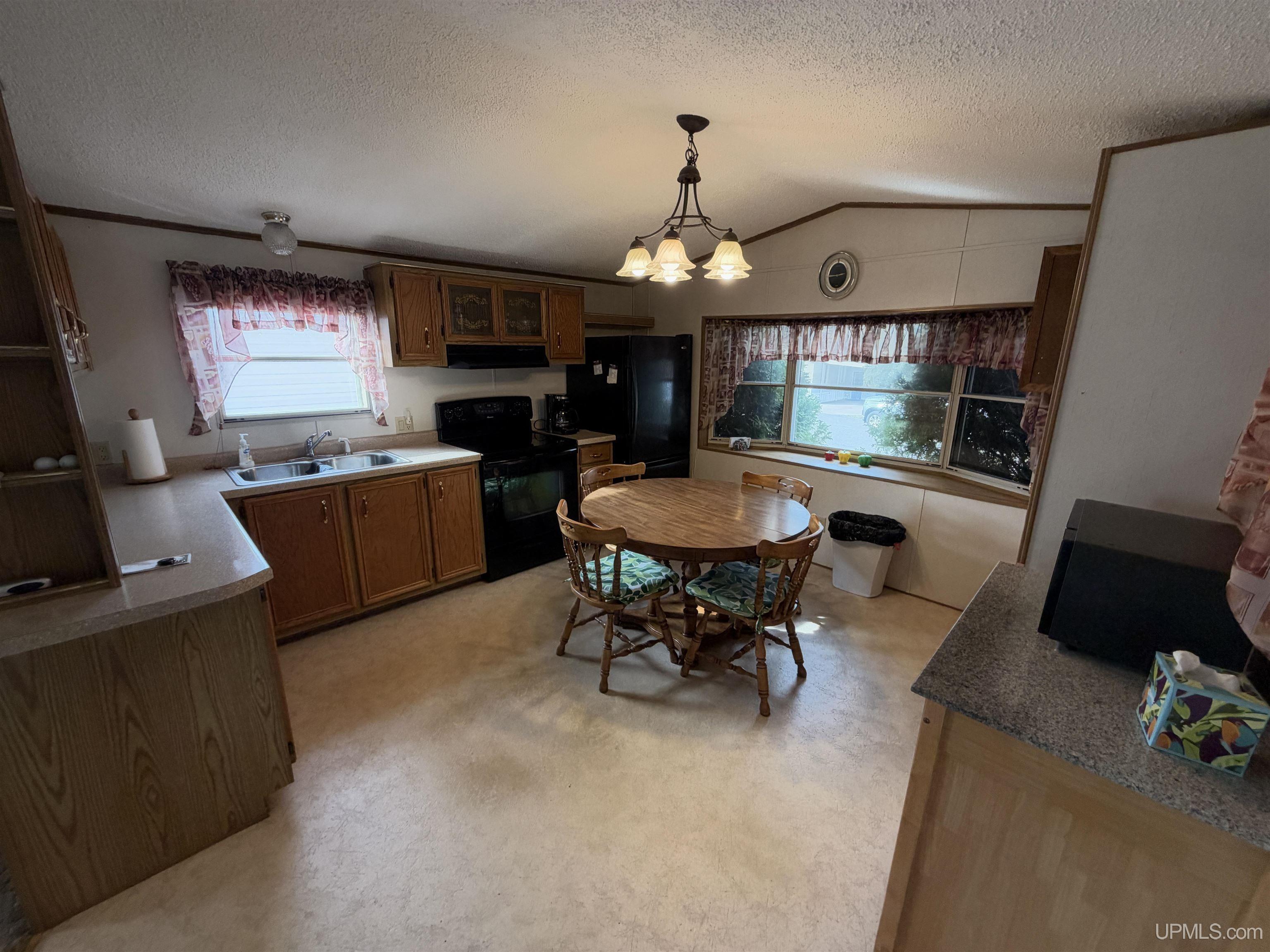 Photo 4 of Manufactured home for sale at W8007 US 141/2 Hwy, Iron Mountain, MI 49801 | MLS# 50223303 | Listing updated on 2026-09-29
