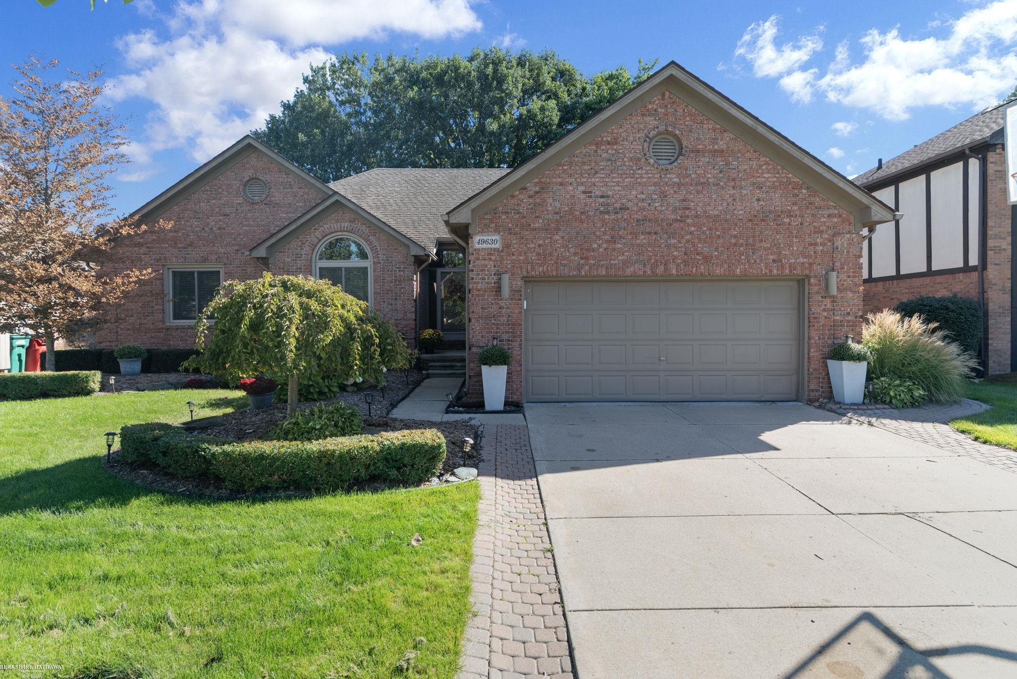 Coming to the market Saturday, October 3! This approximately 2,000-square-foot Macomb Township ranch offers 3 bedrooms, 2.5 baths, and contemporary styling throughout. The spacious great room features a gas fireplace, while the primary suite includes a private bath with a tub and separate shower. Generous closets throughout the home feature organizers. Major updates include the roof, windows, furnace, central air, and hot water tank. Outside, enjoy a two-tier brick paver patio and in-ground sprinklers. The basement adds a state-of-the-art audio studio office. Appliances are negotiable. A one-year home warranty is included with a full-price offer.