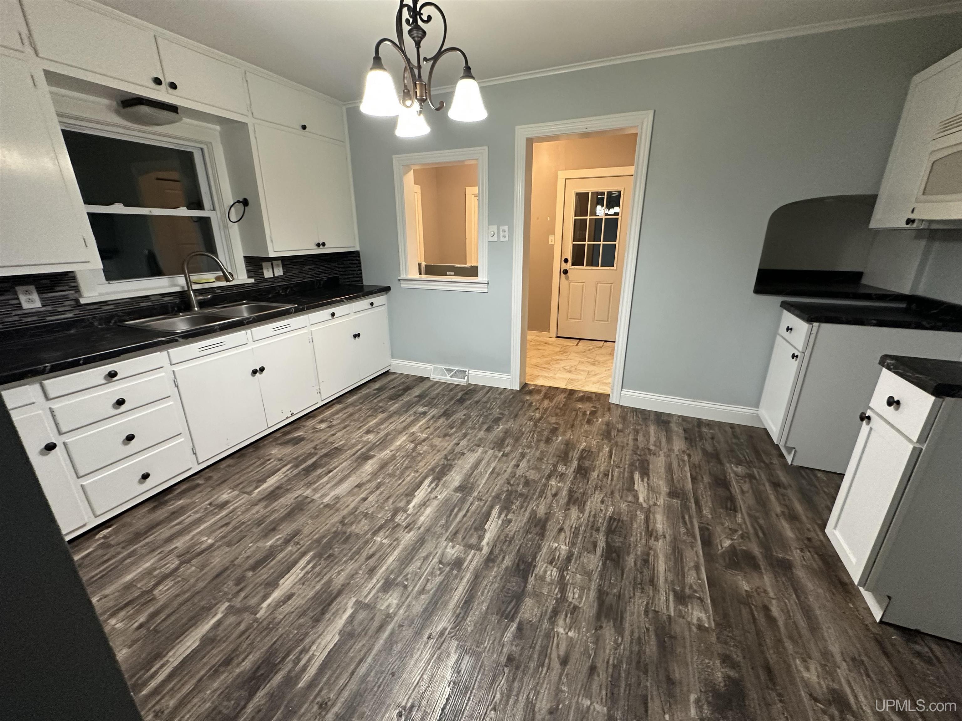 Photo 1 of Single family home for sale at 411 W Ludington St, Iron Mountain, MI 49801 | MLS# 50223345 | Listing updated on 2026-09-29