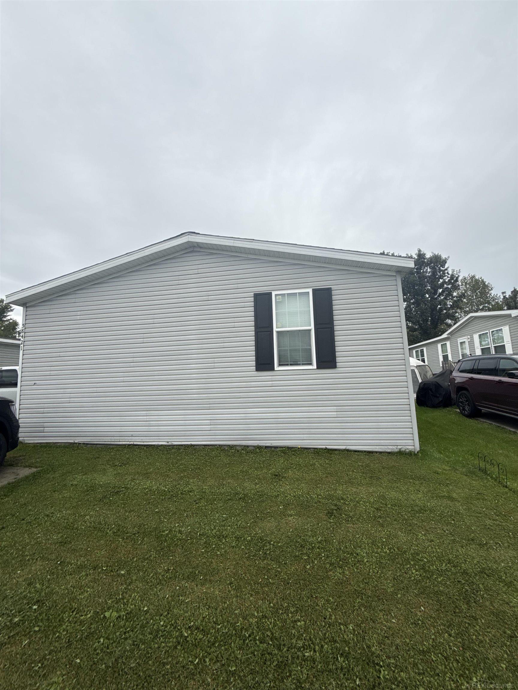 Photo 2 of Single family home for sale at 58421 Brookside Dr, Lenox, MI 48048 | MLS# 58050223451 | Listing updated on 2026-09-30