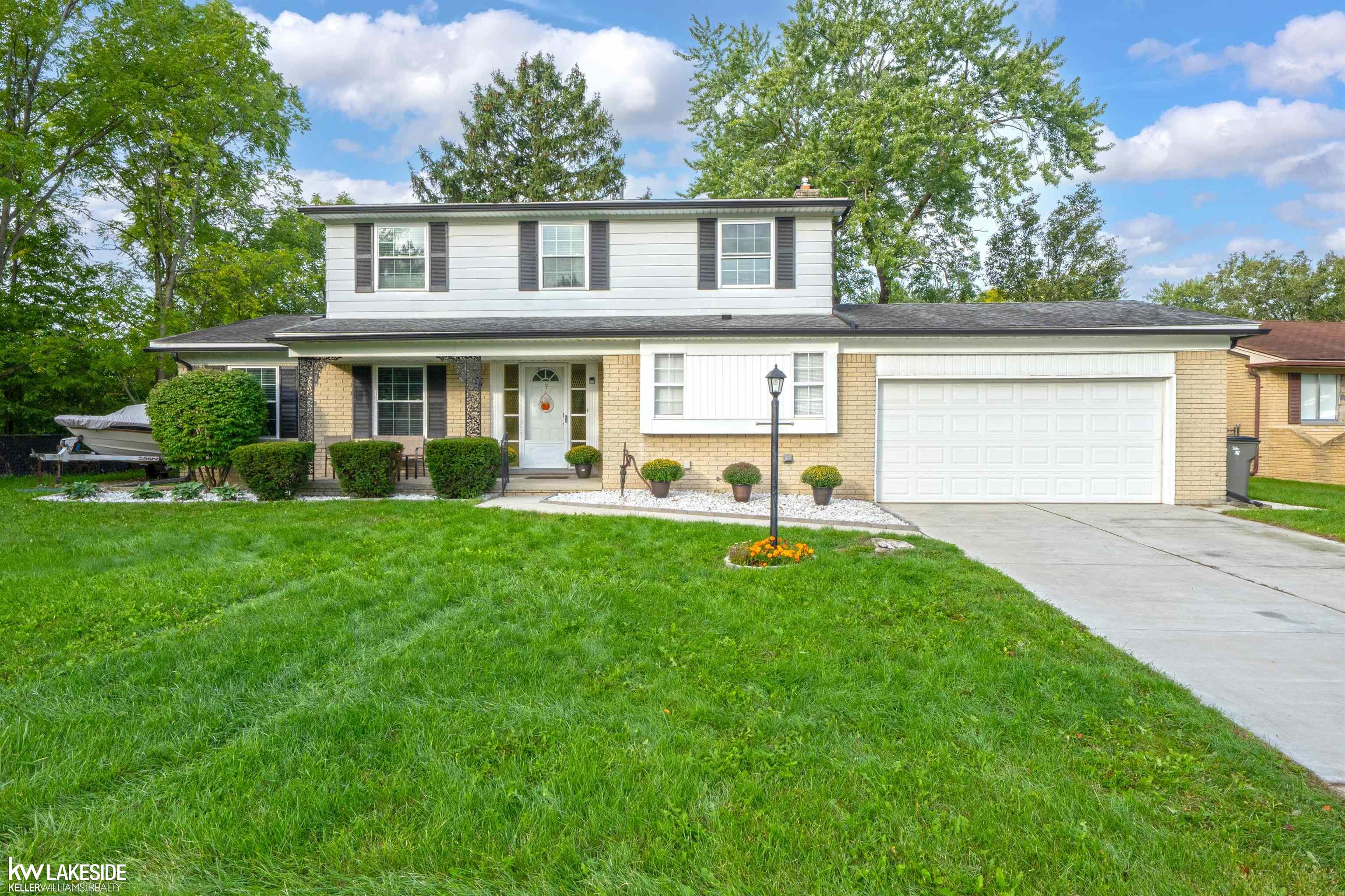 OPEN HOUSE Saturday October 3rd, 2026 from 12PM - 3PM. Updates, Updates, Updates galore in this 4 bedroom, 4 bathroom, 2,100 sq ft, super clean, move in ready colonial! Newer furnace 2019, hot water tank 2020, concrete driveway and patio in 2022. Brand new, beautiful, updated kitchen, recessed lights throughout the house and rest of the house painted in 2023. New windows in 2024! And 3 bathrooms completely updated with luxury touches and the basement finished in 2025! Let's take a look at the details. Step into the beautiful marble foyer. The living room to your left is tastefully done with plenty of space, recessed lights and lots of daylight. Next is the cozy dining room with new light fixtures, both rooms have refinished hardwood floors.  On to the gleaming kitchen, with beautiful quartz counter tops, eye catching cabinets, newer stainless steel appliances, and new tile floor. Off the kitchen is your living room, with natural fireplace, brick accent wall and mantel, sliding door to the backyard, and hardwood floors. Continue to the 1st floor laundry room, completely updated half bathroom and garage. Upstairs are the 4 bedrooms, with refinished hardwood floors throughout. Beautifully updated shared bathroom with double sinks, and bathtub, really stands out. The primary bedroom has lots of space and a renovated bathroom as well. The finished basement is nicely done with brick surround gas fireplace, a half bathroom, tons of shelf and storage space.  A long driveway, deep lot, fenced in yard, new patio to BBQ, and extra boat/car storage space on the side of the house gives plenty of opportunities to enjoy the outside as well. Throughout the house, the color schemes, lighting, flooring, decorating, and the daylight really flows together well. Not just in the photos! One year home warranty is included. So come see for yourself, and welcome home!