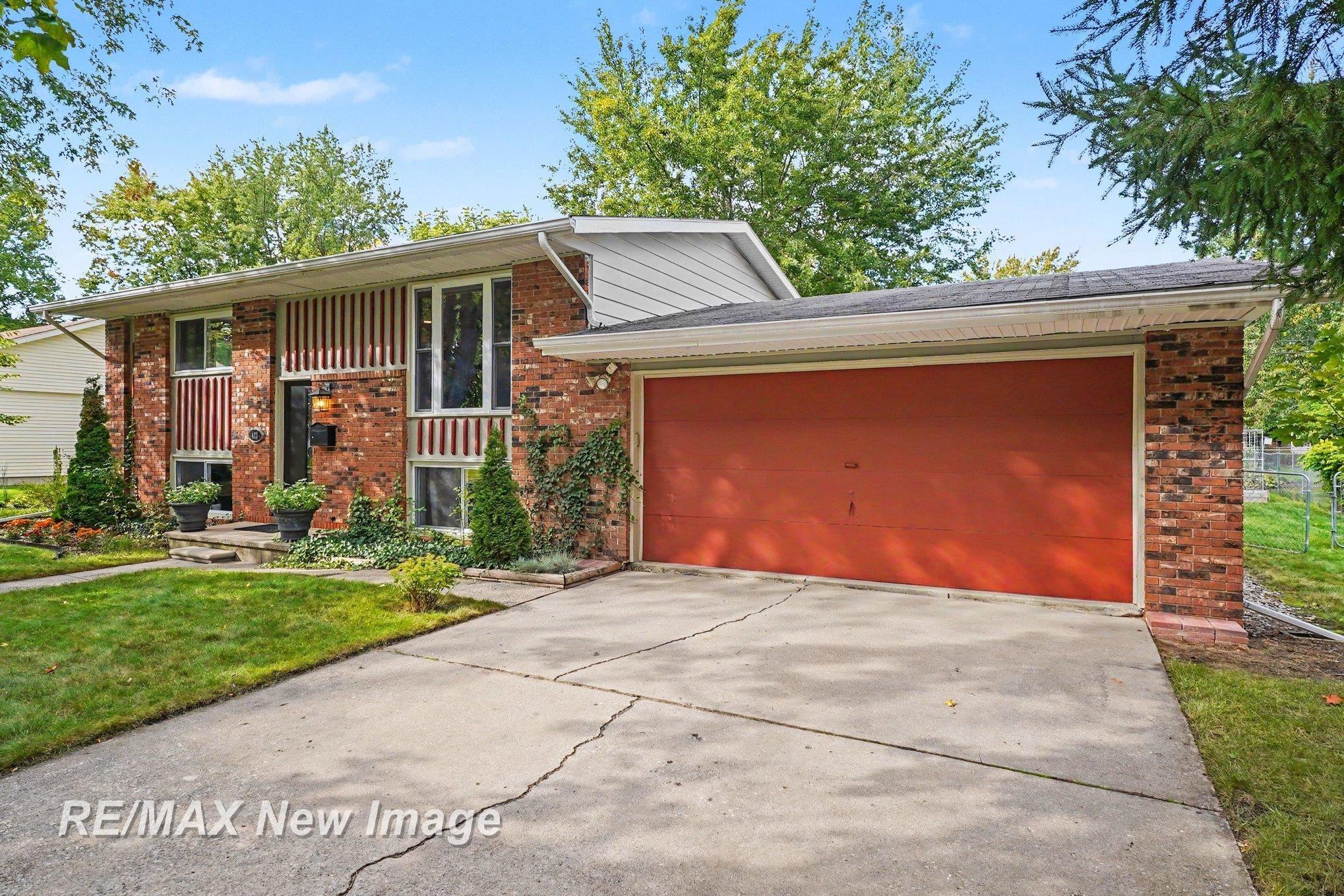 Photo 1 of Single family home for sale at 413 Hollybrook Dr, Midland, MI 48642 | MLS# 61050223786 | Listing updated on 2026-10-07
