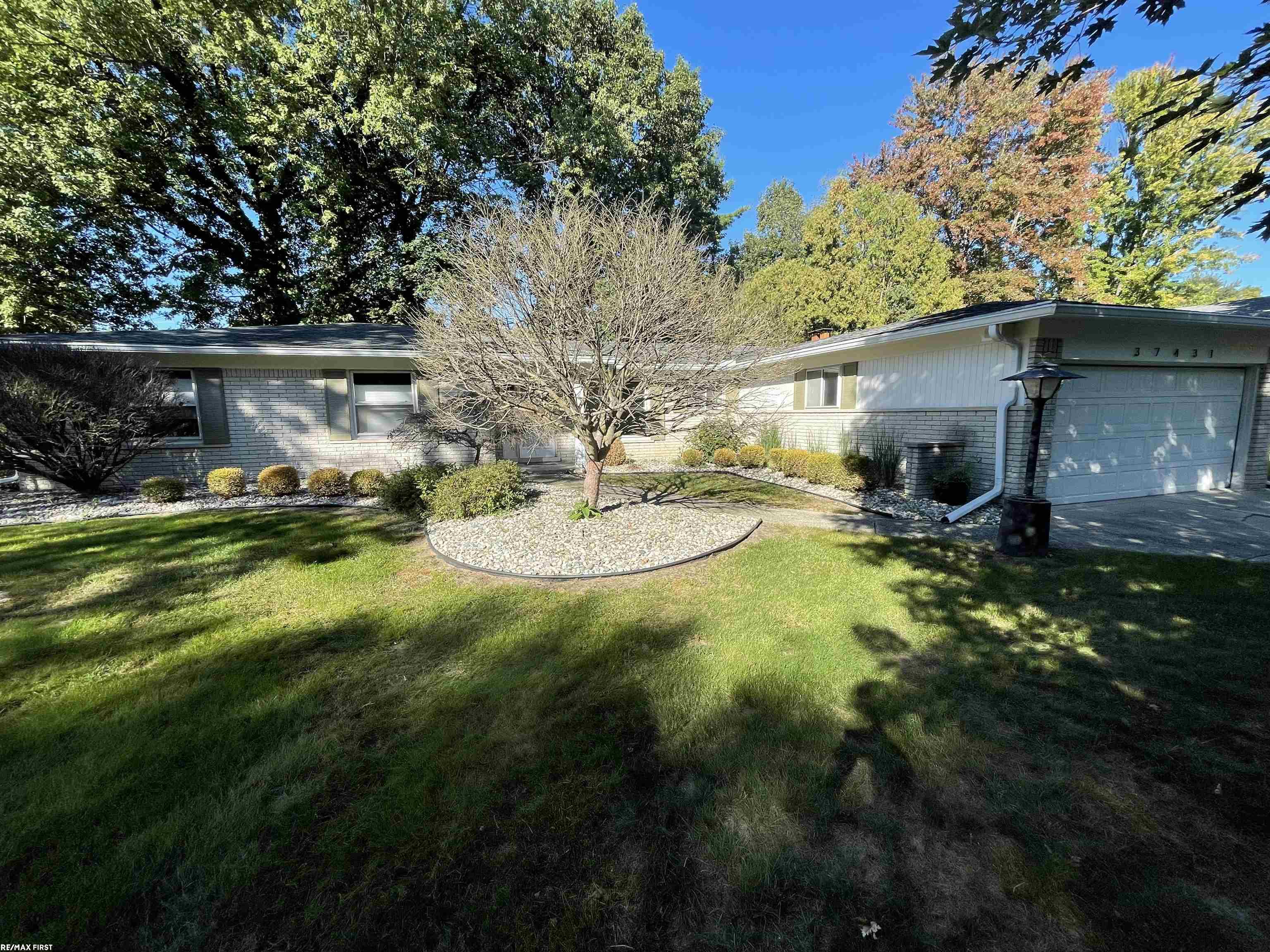 Open House Thursday Oct 8th 5-7pm Outstanding Moravian Forest Sub West of Garfield, South off Millar Road. Super clean 3 bedroom 2 1/5 bath 2,036 sqft brick ranch w/full basement, family room w gas fireplace and doorwall to trex deck, formal dining room, extra large eat in kitchen w/double pantry and hardwood flooring. Central A/C, 1st floor laundry, 2 1/2 car attached garage, private yard w/deck and mature trees. "Keys at closing".