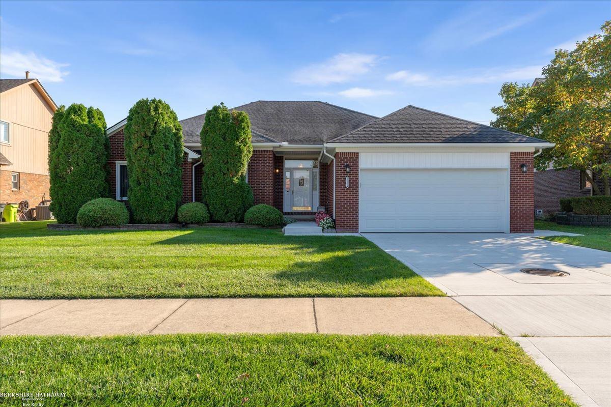 Beautifully maintained Macomb Township ranch offering 3 bedrooms plus a den, ideal for a home office or flex space. Recent improvements include a new driveway installed in 2024 and exterior new trim, gutters and door wall completed in 2024, enhancing both curb appeal and interior style. The home features bright living areas, a functional kitchen, and a private backyard suited for everyday enjoyment. A clean, move-in-ready property in a desirable community with key updates already completed.