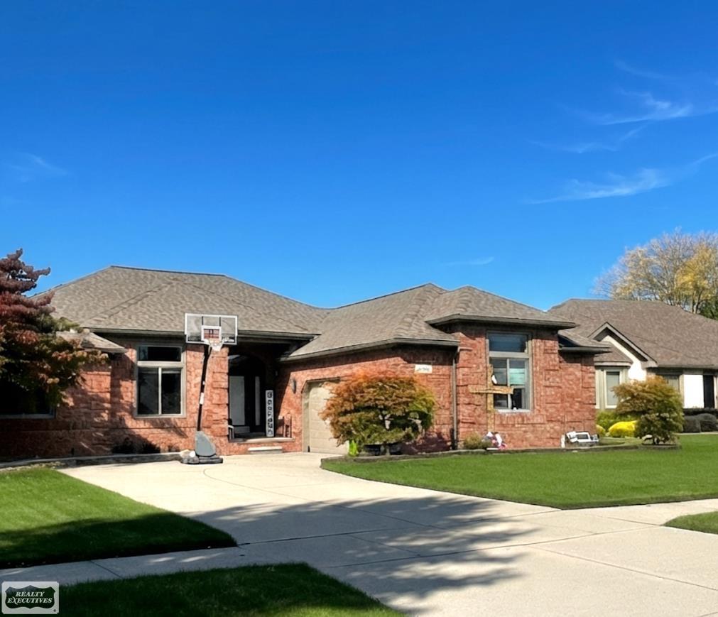 **OPEN HOUSE - Sunday, Oct. 18th from 12-3:00** Welcome to your ultimate staycation home! Secure your family's future in this stunning, fully updated all-brick ranch featuring timeless coin corners and unmatched curb appeal on one of the largest lots in the entire subdivision. Meticulously maintained living space, the freshly painted interior shines under tons of new recessed lighting. The hub of the home is a beautiful kitchen loaded with premium stainless steel appliances, designed to handle everything from busy school mornings to gourmet dinners. Downstairs, the massive finished basement is an entertainer's paradise-large enough to host the entire extended family for the holidays and create unforgettable memories. Step into the backyard and discover a true family dream. The enormous, newly fenced yard is wrapped in gorgeous brick pavers and completely equipped for endless outdoor fun, featuring a crystal-clear pool and a dedicated volleyball area. It is an expansive, secure oasis where you will spend all your time-there is truly no need to ever leave. Best of all, this home keeps your future secure and affordable. A newer roof paired with advanced solar panels makes your utility bills nearly obsolete. With an abundance of space, high-end updates, and premium features around every corner, this is the home where everyone will want to be. Schedule your tour today to review the floor plans, seller disclosures, and incredibly low utility bills-this dream home is waiting for you.