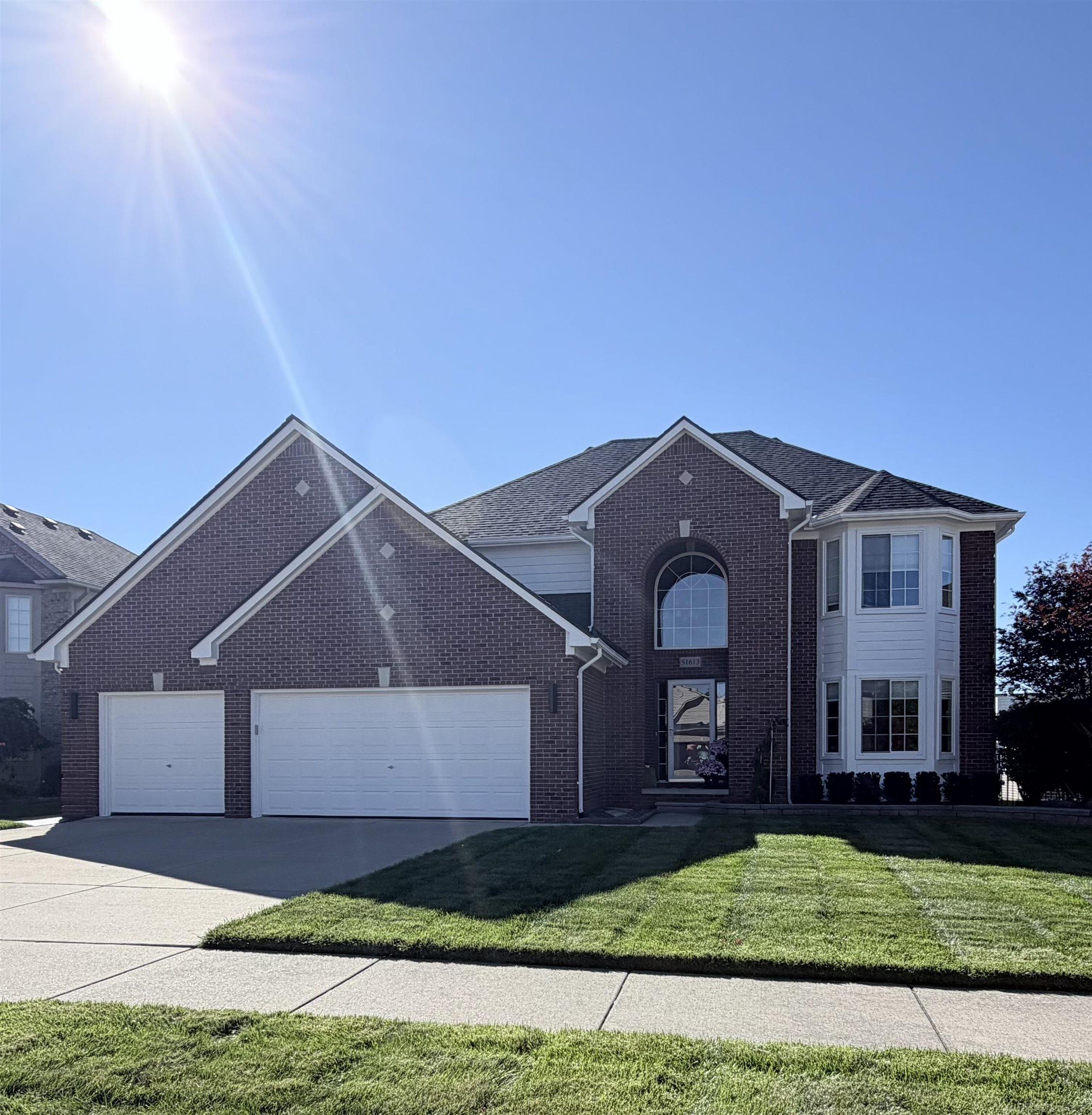 **OPEN HOUSE - SATURDAY 10/24 FROM 11AM-1PM** Move right in and celebrate the holidays in this exceptionally maintained 4-bedroom colonial in New Baltimore! Extensitve updates include windows, flooring, A/C, furnace, HWT, roof, granite and quartz countertops, backsplashes and so much more! Generous room sizes. Check out the finished basement and find a 5th bedroom along with a FULL bathroom, along with a tastefully designed bar. Hook up your TV, grab a drink, and you're ready for football season! Escape to your backyard oasis, complete with a hot tub and above-ground pool. A three-car garage provides ample space for vehicles and storage. This home is beautifully updated and ready for it's next chapter! Make it YOURS!