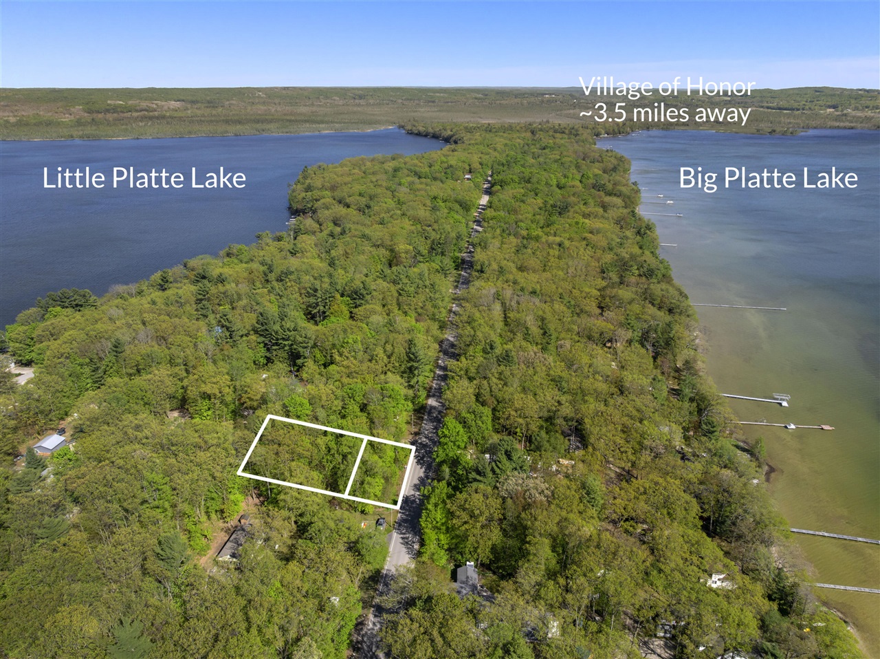 1st image of 102 104 Poplar Ave, Honor, MI 49640 | MLS# 70517060