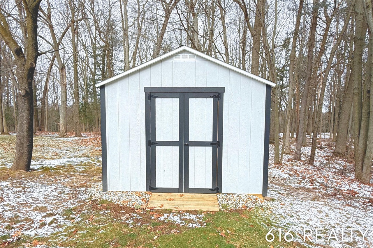 7358 Willow Wood Drive, Belmont, MI, 49306-9419