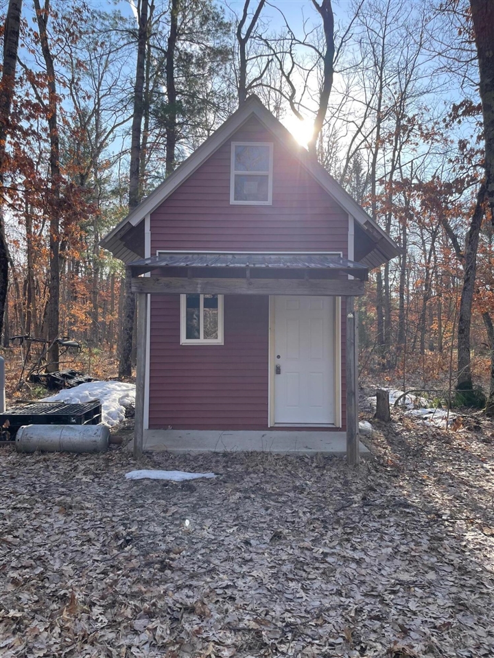 1st image of 21210 W 12 Mile Rd, Irons, MI 49644 | MLS# 70522200