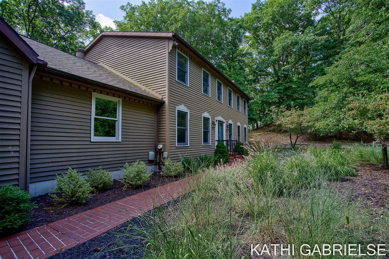 1st image of 313 Stickney Ridge Rd, Grand Haven, MI 49417 | MLS# 70530337
