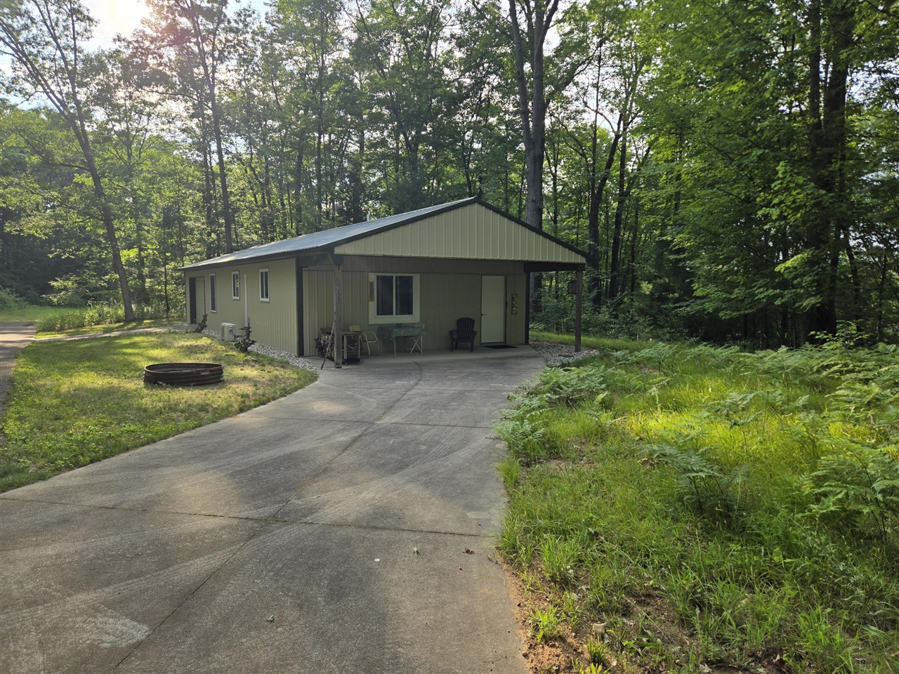 1st image of 8207 N Hunters Ridge Dr, Irons, MI 49644 | MLS# 70545327