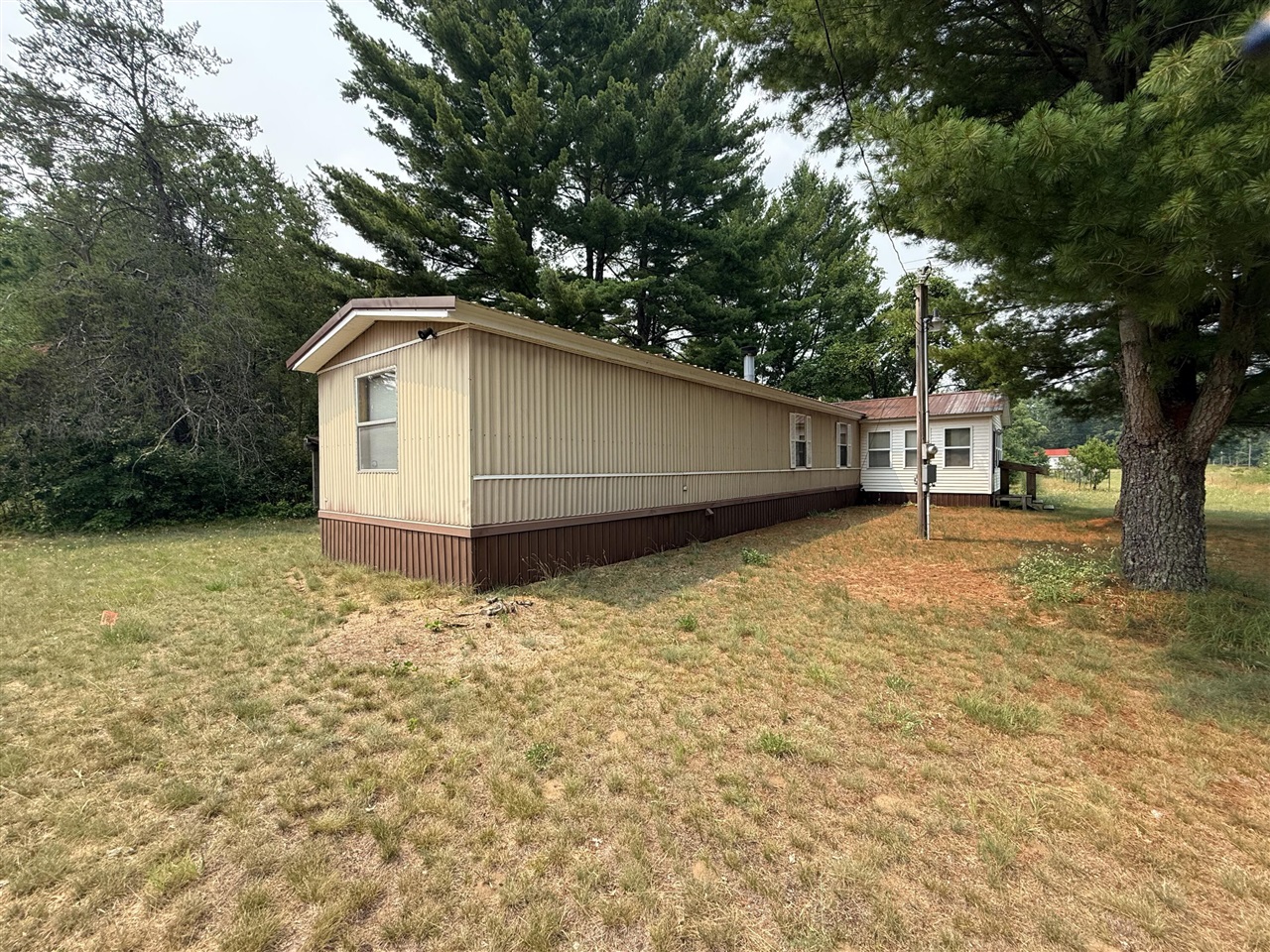 1st image of 6661 S Tacoma St, Idlewild, MI 49642 | MLS# 70547607