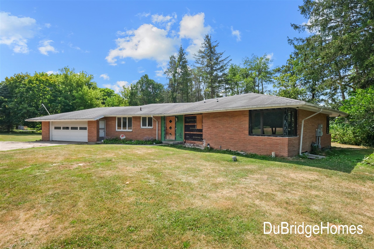 1st image of 311 Honey Creek Ave, Ada, MI 49301 | MLS# 70553044