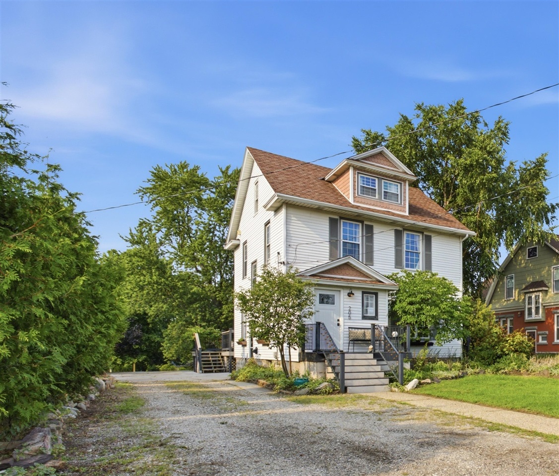 Photo 2 of Sale Pending at 205 E Savidge St, Spring Lake, MI 49456 | MLS# 70553305 | Listing updated on 2026-09-17