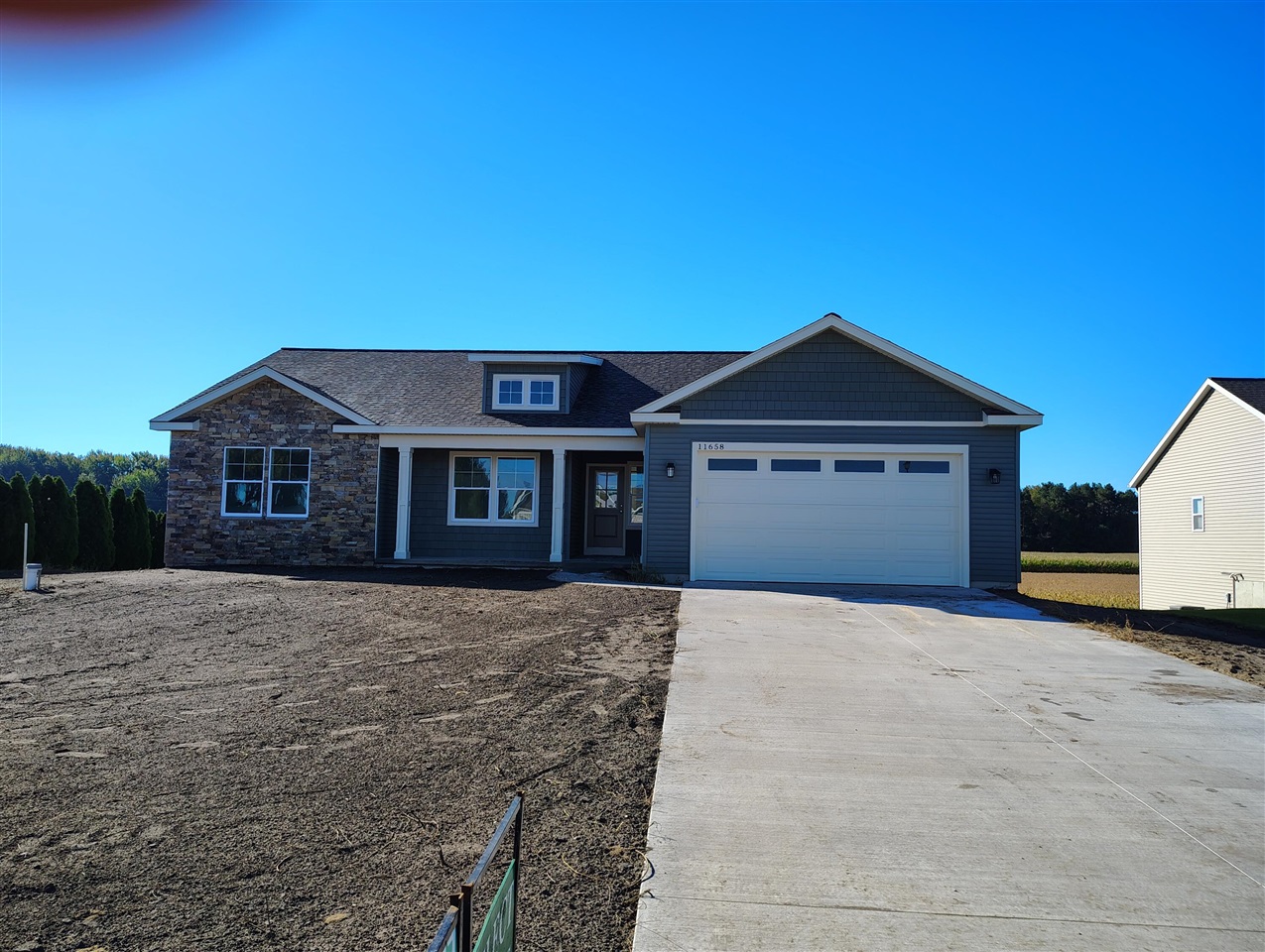 Single family home for sale at 11658 Olive Lake Dr, West Olive, MI 49460-7902 | MLS# 70555438