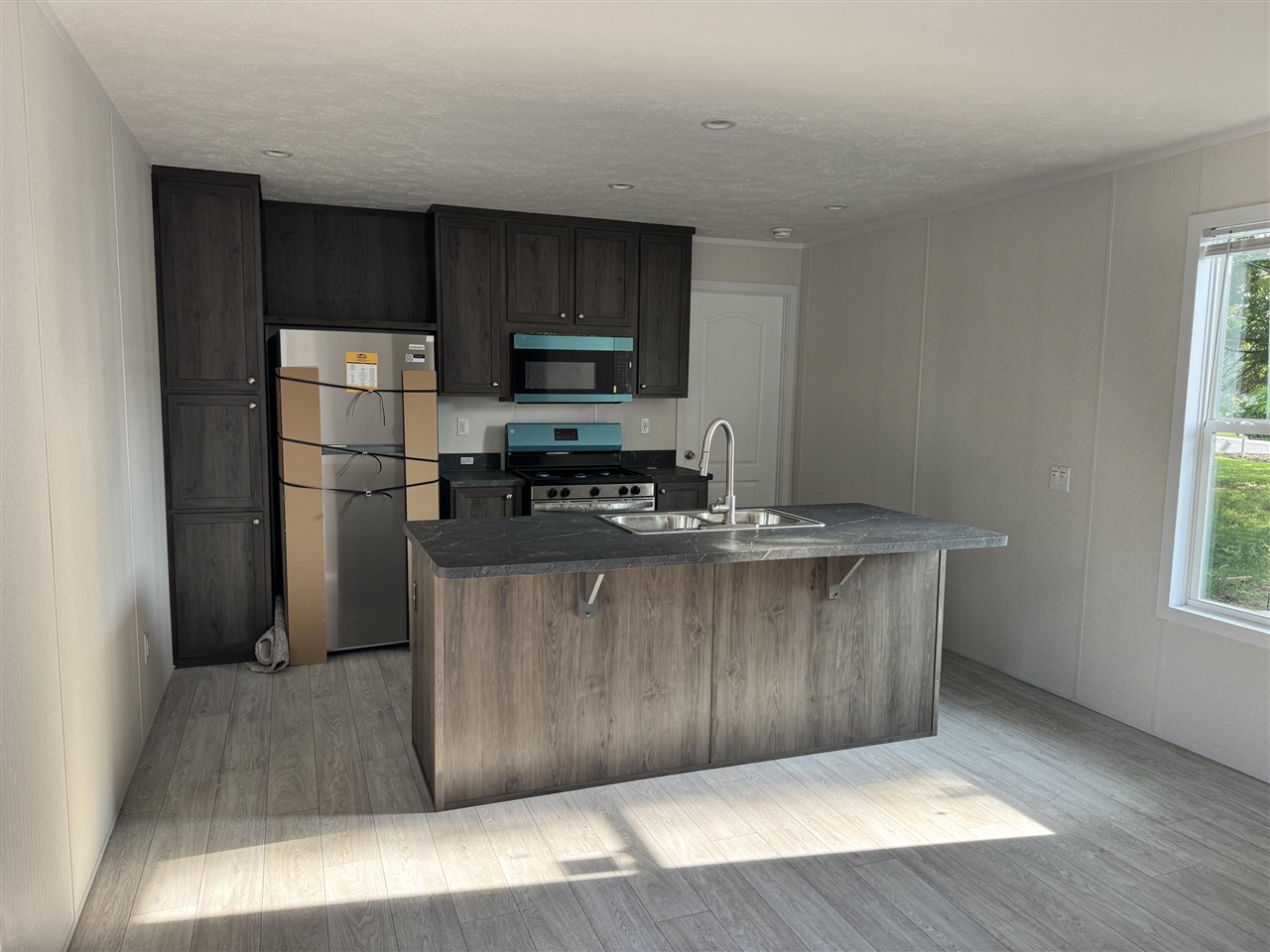 Photo 3 of Single family home for sale at 4747 W River Dr #56, Comstock Park, MI 49321 | MLS# 70559857 | Listing updated on 2026-09-21