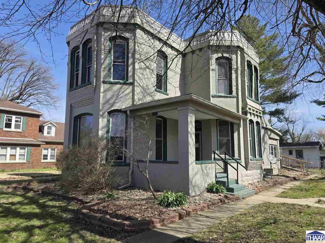 This historical home is a "Castle Home" in Dana Indiana.  Home offers natural woodwork with built-in cabinets, beautiful staircase. Home had many updated over the past few years. Home has a good size kitchen with stainless steel sink and some appliances that was left with no guarantee.  Home includes a 2-bedroom 1-bath apartment over the garage currently that could be extra income or a guest house for family members.