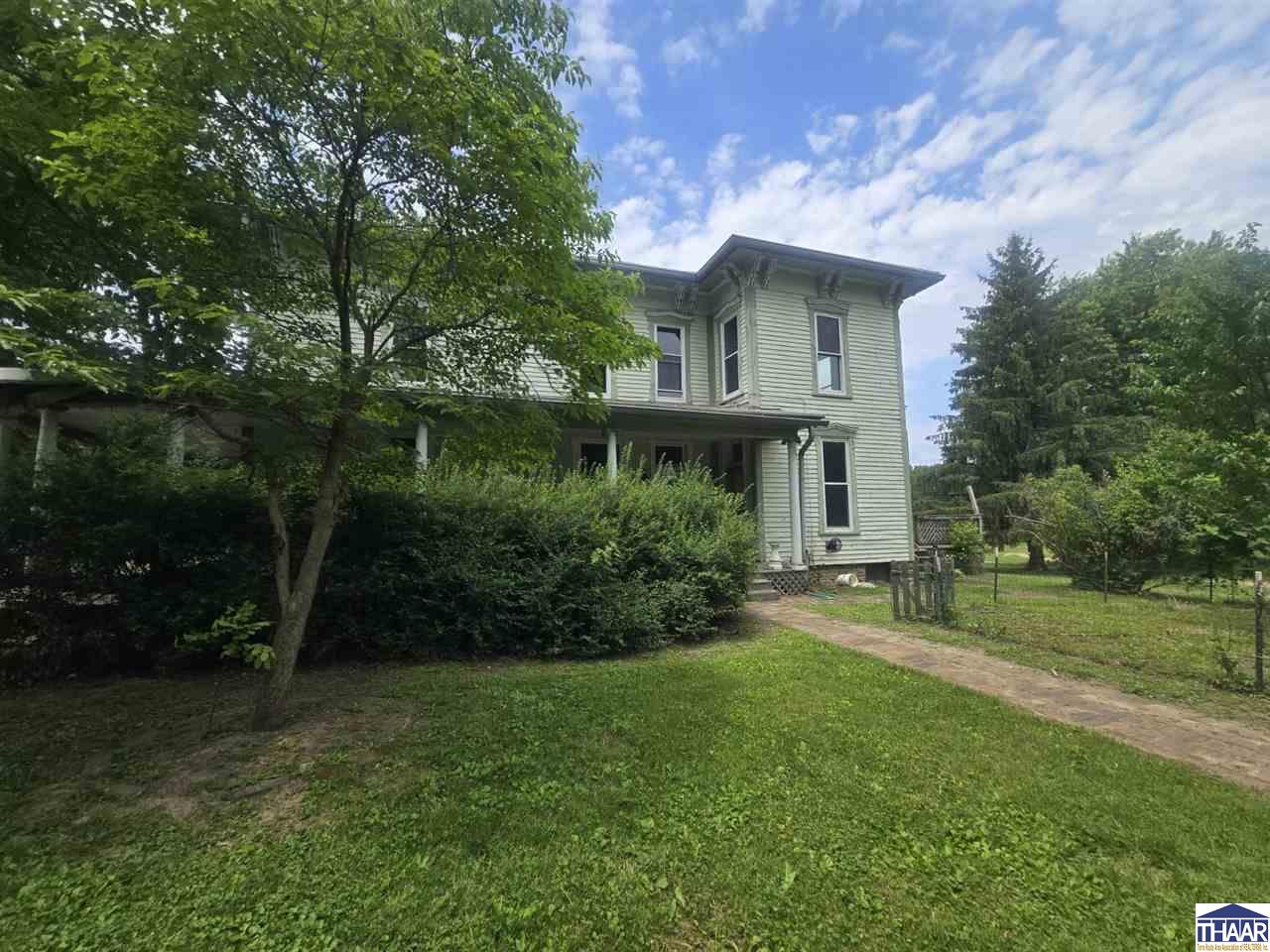 Here's your chance to own this historic home on 1.13 acres. Step back in time and imagine all the memories this 1822 Victorian Home has shared throughout the years. The quiet evenings spent on the front porch or just a short walk to downtown but still in a country feel. Live near the DePauw Nature Park & enjoy the shady trees on those warm summer evenings. Home features updated kitchen & bathrooms, 4 bedrooms on the upper level, 2 lower rooms that could be bedrooms or craft room or den. There is a massive laundry room /pantry, a large deck on the overlooking the back yard. Beautiful wrap-around porch, as well natural woodwork and staircase, 2-fireplaces, & wood flooring. There are so many other features to list.