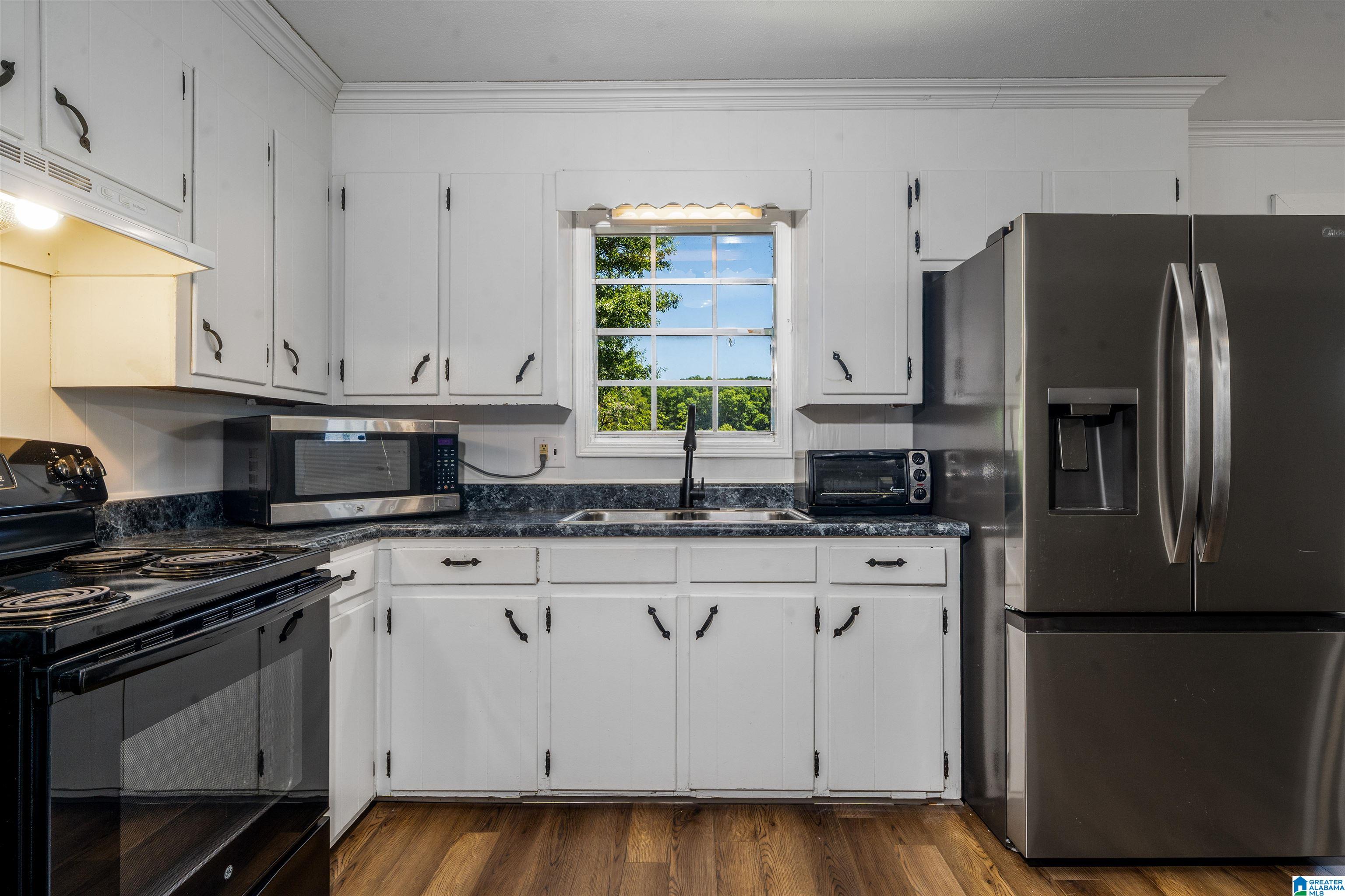 4th image of 2105 Crestwood Avenue, Northport, AL 35476 | MLS# 21435448
