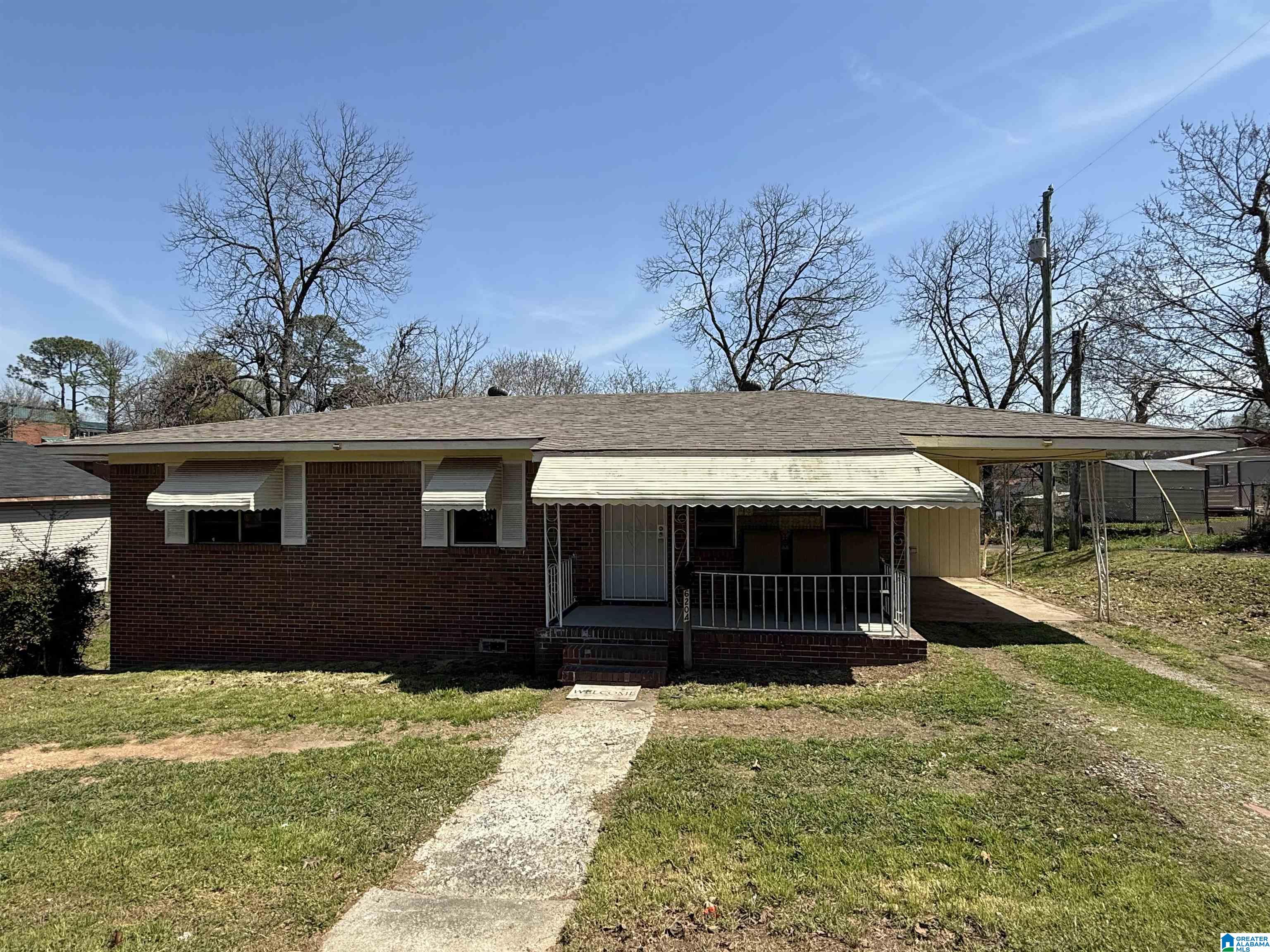 Great first home or rental property just a couple blocks from Miles College Campus!  Freshly painted 3 bedroom, 1 1/2 bath all brick home on extra large lot. The home was fully renovated in 2019 with new HVAC, roof, water heater, some windows, plumbing, electrical, and luxury vinyl plank flooring.  Primary bedroom is large for this age home with a double closet.  Full bath has been updated new shower, vanity and toilet in 2019.  Partial basement great for storage or a work shop.  All this home needs is for your personal touches!