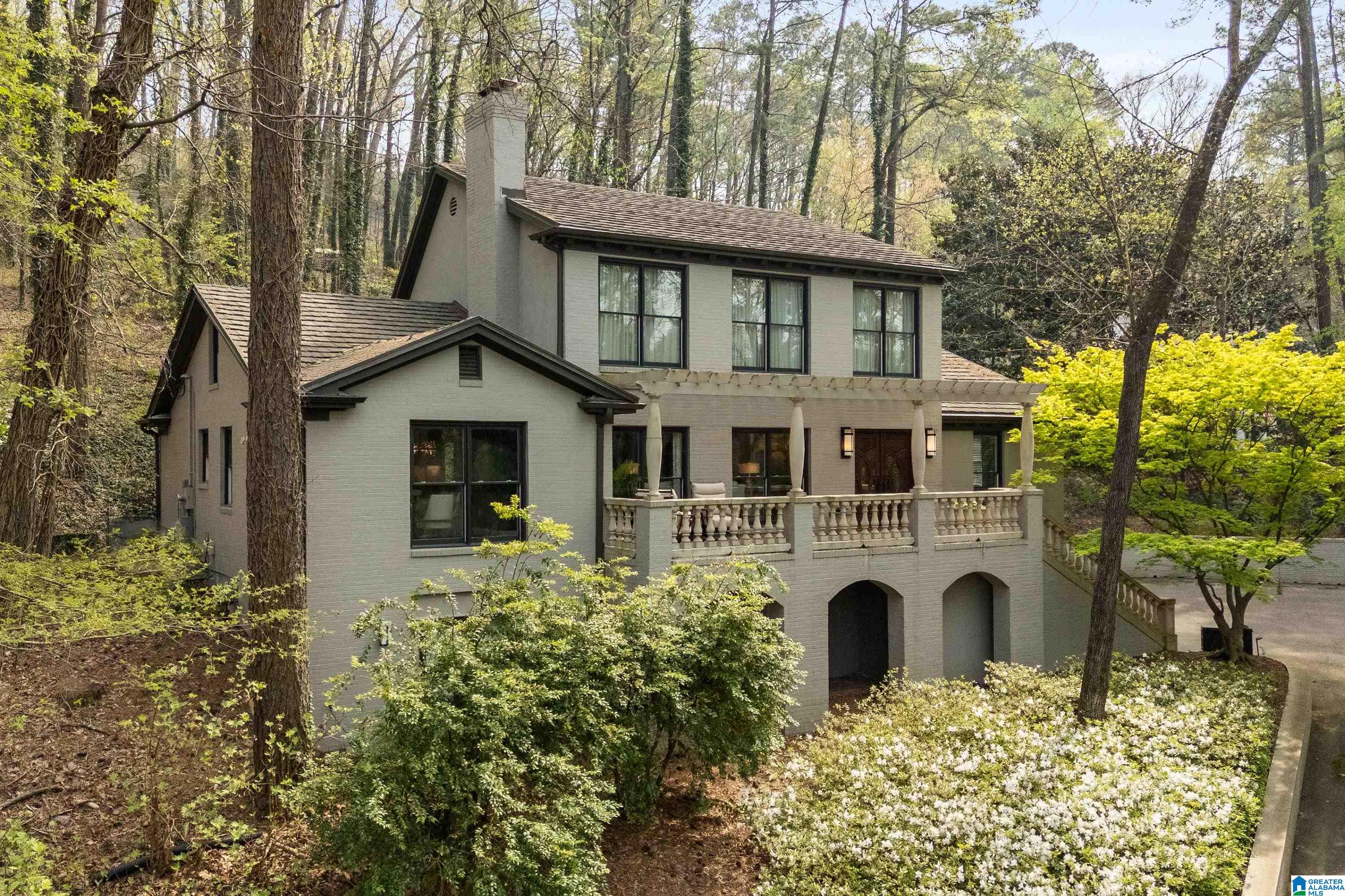Welcome to 3409 Cherokee Rd — a rare opportunity to own a fully renovated 4 bedroom, 4.5 bath home overlooking Mountain Brook Golf Course and zoned for Mountain Brook Elementary. Situated on a private 0.95 acre lot, this exceptional property features a main level garage, lifetime metal composite roof, new windows, Kohler 20Kw whole house generator, and a full finished basement. The chef’s kitchen features custom cabinetry, granite countertops, Sub Zero refrigerator, Wolf gas cooktop with vent hood, KitchenAid dishwasher, beverage refrigerator, warming drawer, double ovens, and a stunning labradorite waterfall island. The luxury primary suite includes a sitting area and spa-inspired bath with heated floors, Kohler intelligent toilet, Opalia soaking tub, Bosch towel warming drawer, and two custom walk-in closets, including a dedicated shoe closet. Beautiful living spaces, brick patio, and breathtaking views complete this remarkable home.