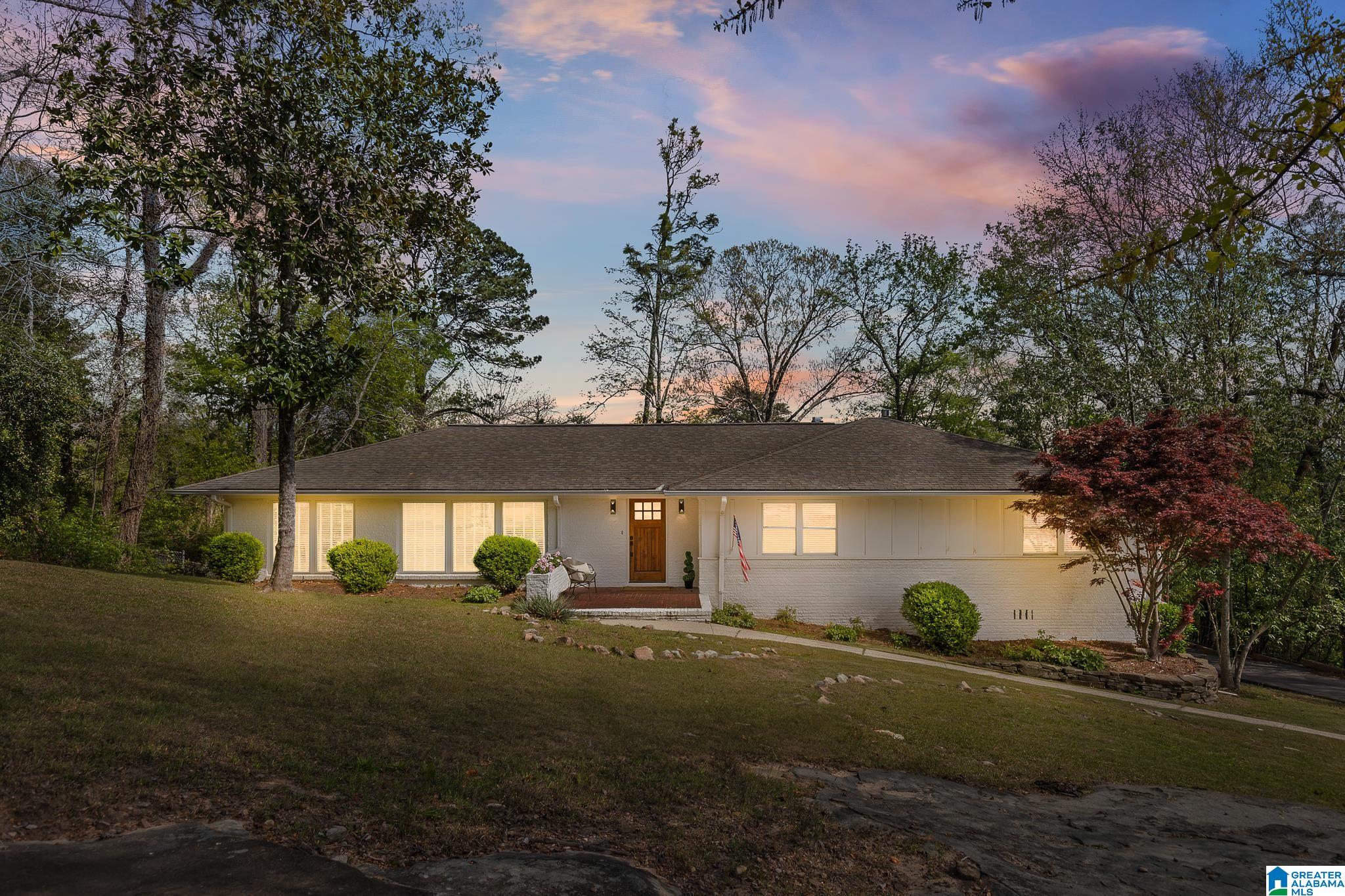 Just Listed! The stunning 4 BR/3.5 BA brick ranch offers so many upgrades & updates. Situated on over half acre w/ seasonal views & zoned for the award winning East elementary. As you step inside, you'll be greeted by a spacious open floor plan that seamlessly connects the living, dining & kitchen areas, making it perfect for family gatherings and entertaining friends. Large windows flood the space with natural light and provide a lovely seasonal mountainous view. The updated kitchen features a butlers pantry, generous island w/ modern appliances & serving bar for the perfect hosting opportunities. The master suite is a true delight w/private en suite, walk-in-closet, & mountain views to wake up to and enjoy! With 3.5 baths, the morning routine will be a breeze for everyone in the household. Abundance of closet space & storage! Venture downstairs to find a large play/rec room with full bath & 4th bedroom. The privacy of the backyard & the quiet street make it a gem. Showings start 4/8!