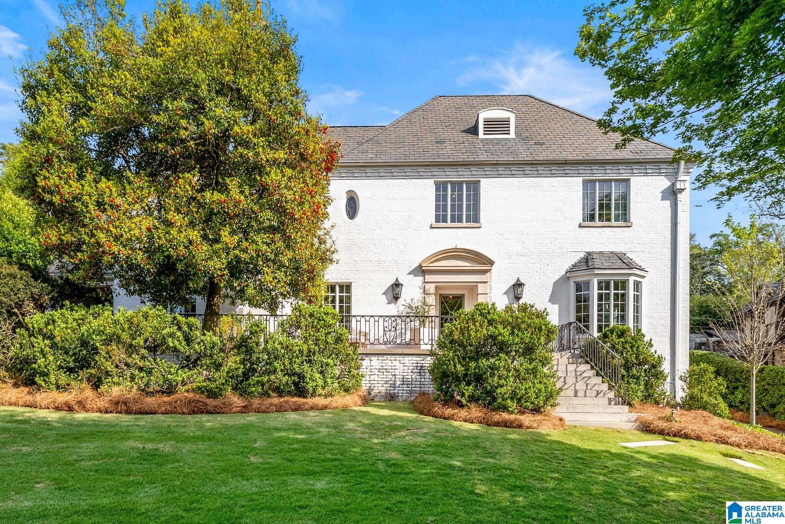 Exquisitely updated 4 bedroom, 5 full bath, 1 half bath home offering timeless elegance and exceptional livability—no detail overlooked. The main residence features four beautiful full baths, while a private guest cottage above the garage by architect Jeffrey Dungan includes a kitchenette, integrated appliances, and a fifth full bath. Renovated by a noted designer, the home showcases luxury-appointed lighting, marble baths, refinished hardwoods, and exceptional custom cabinetry and closets throughout. Gracious main-level living spaces are ideal for both everyday living and entertaining. The chef’s kitchen features Sub-Zero and Wolf appliances, steam convection oven, Alabama White marble countertops, and a built-in pet kennel. A butler’s pantry offers a versatile keeping room or breakfast area with built-in cappuccino maker, refrigerated drawers, and ice maker. The primary suite features a fireplace and separate his and her baths. Outdoor living includes a patio and rose garden.