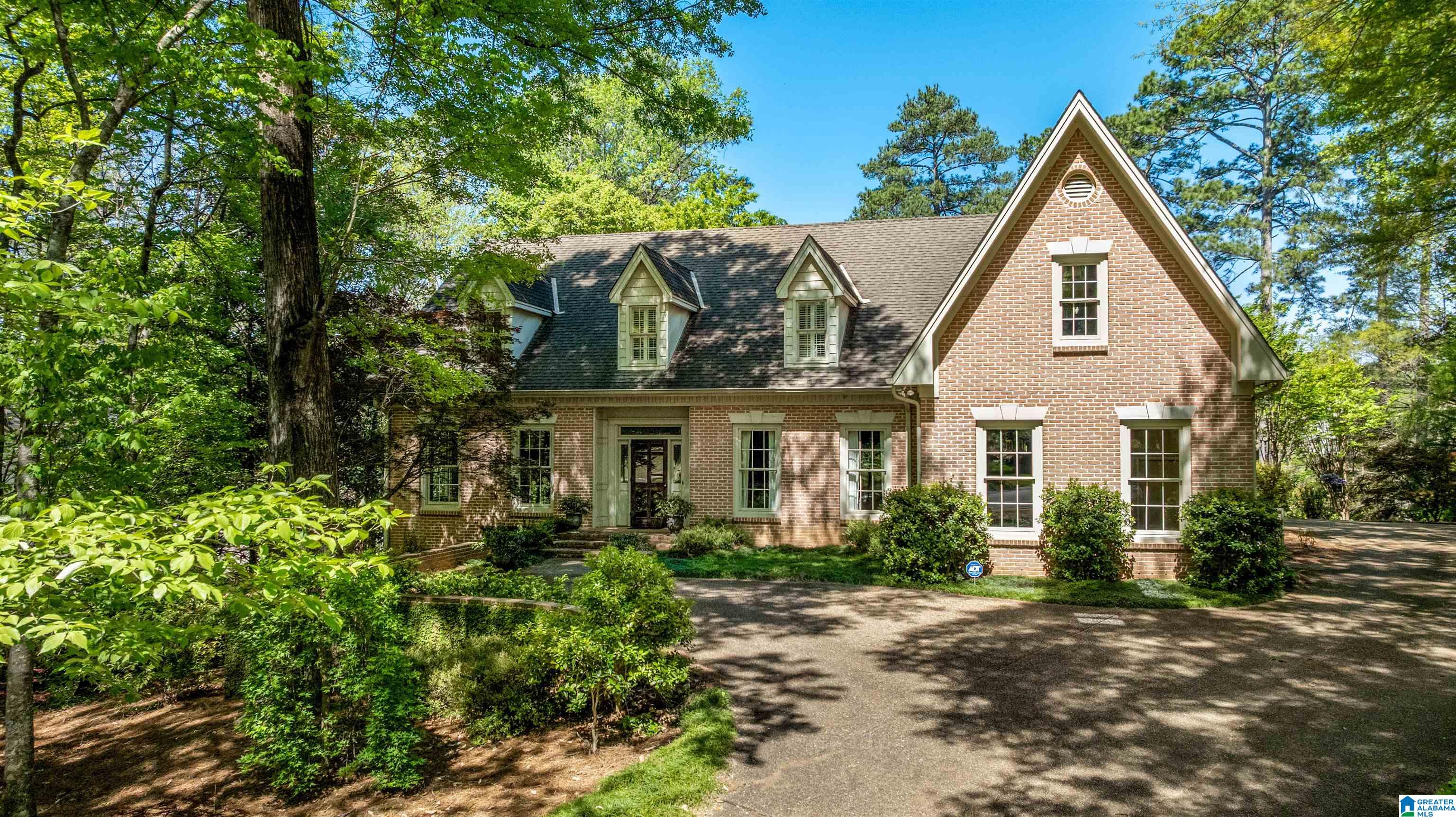 Incredible opportunity for tons of space in Mountain Brook! Nestled on a quiet street zoned for Crestline Elementary, this 4BR/4BA home has beautiful curb appeal and welcoming interiors. The main level has a fabulous great room that opens to a massive screened-in sunroom - the perfect place to relax year around. The kitchen has great storage, an island with gas range, a pantry, bar area, and breakfast room. At the front of the house, the dining room easily accommodates a large dining table, and the front living room makes a great sitting room or home office. Also on the main, a large master suite with his & hers full bathrooms and walk-in closets. Upstairs, there are three bedrooms and two full baths, a walk-in attic, and a large landing area with space for a desk or sitting area. Great detail throughout with built-ins, hardwood floors, and nice storage across both floors. If you're looking for square footage on a nice lot in Crestline - this is the one!