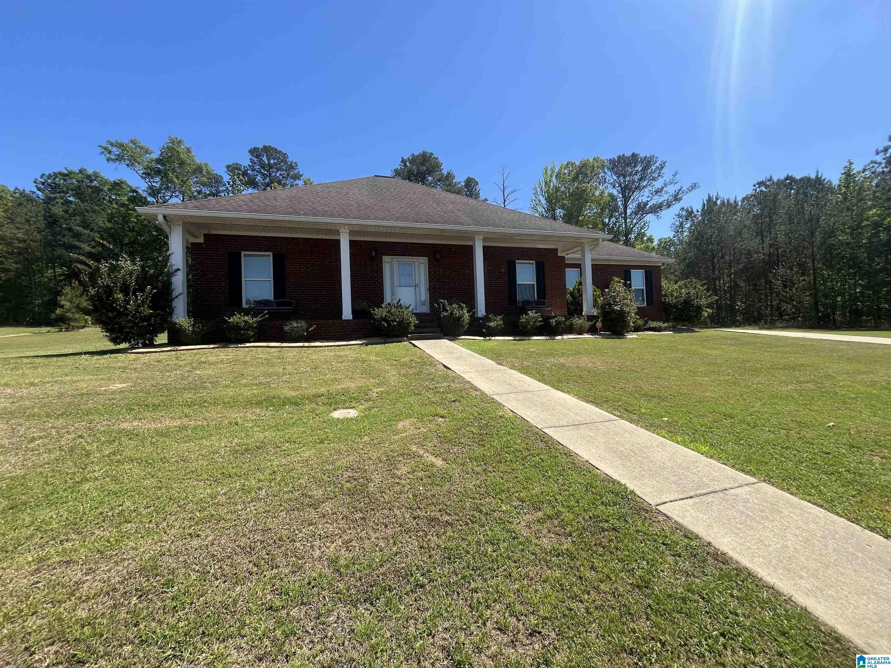 Stunning all-brick home located in the desirable River Point subdivision in Tuscaloosa! This beautiful 3-bedroom, 2 full bath, and 1 half bath property offers both comfort and style with an array of upscale features throughout. Step inside to find elegant crown molding, rich hardwood floors, recessed lighting, and an open-concept layout perfect for modern living and entertaining.The kitchen is a true highlight, featuring granite countertops and a seamless flow into the main living areas.Situated on two lots, this property offers extra outdoor space-perfect for entertaining and enjoying the outdoors. The home features a two-car garage, a fenced backyard, and an irrigation system for added convenience. Residents of the community enjoy HOA amenities including private boat access to the Black Warrior River, two scenic ponds, and a playground. Schedule your showing today and make this beautiful house your next home-contact your favorite agent for more details!