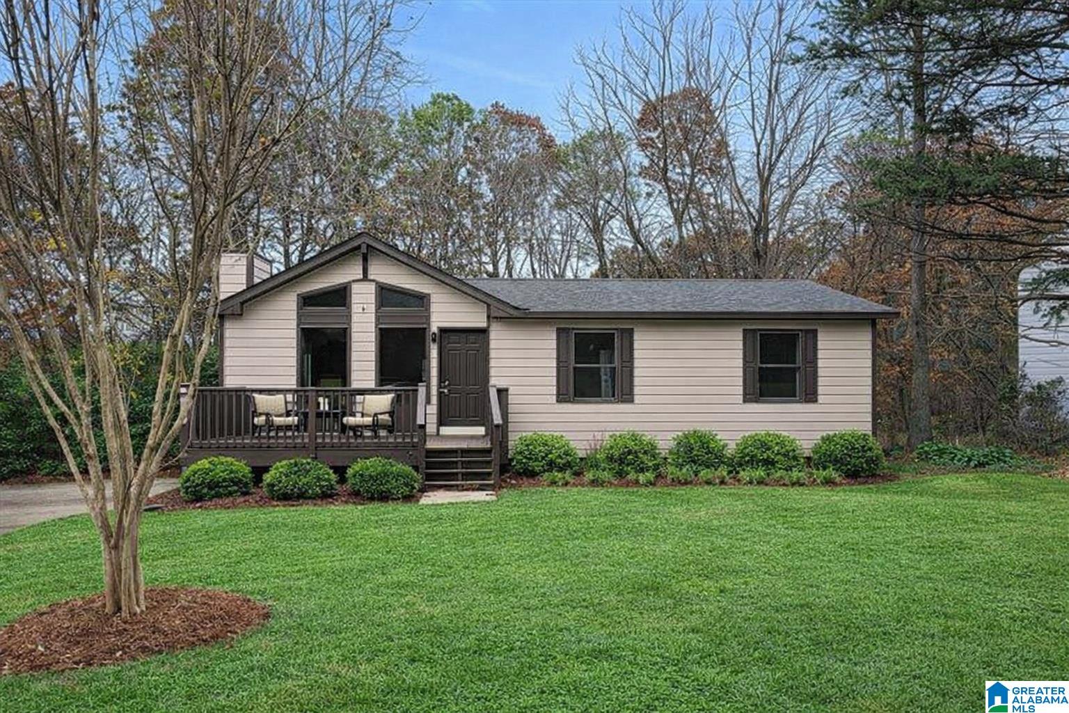 Move in ready home that has recently been updated! This home features 3 bedrooms & 1 full bathroom on large lot with fenced back yard.  Oversized front porch leads to entryway into the living room with stone fireplace & vaulted ceilings with exposed wood beam. Updated flooring, paint & light fixtures throughout. Dining room opens to updated kitchen with some new cabinets & countertop. Laundry room off of kitchen for extra storage & access to the side deck for grilling.  There are 3 good sized bedrooms with closets & they share the full hall bathroom with a tub/shower combo. Out back features a large back yard and a private wooded view. Convenient location with only 6 minutes to Sun Valley Elm school & 20 mins to downtown Birmingham!