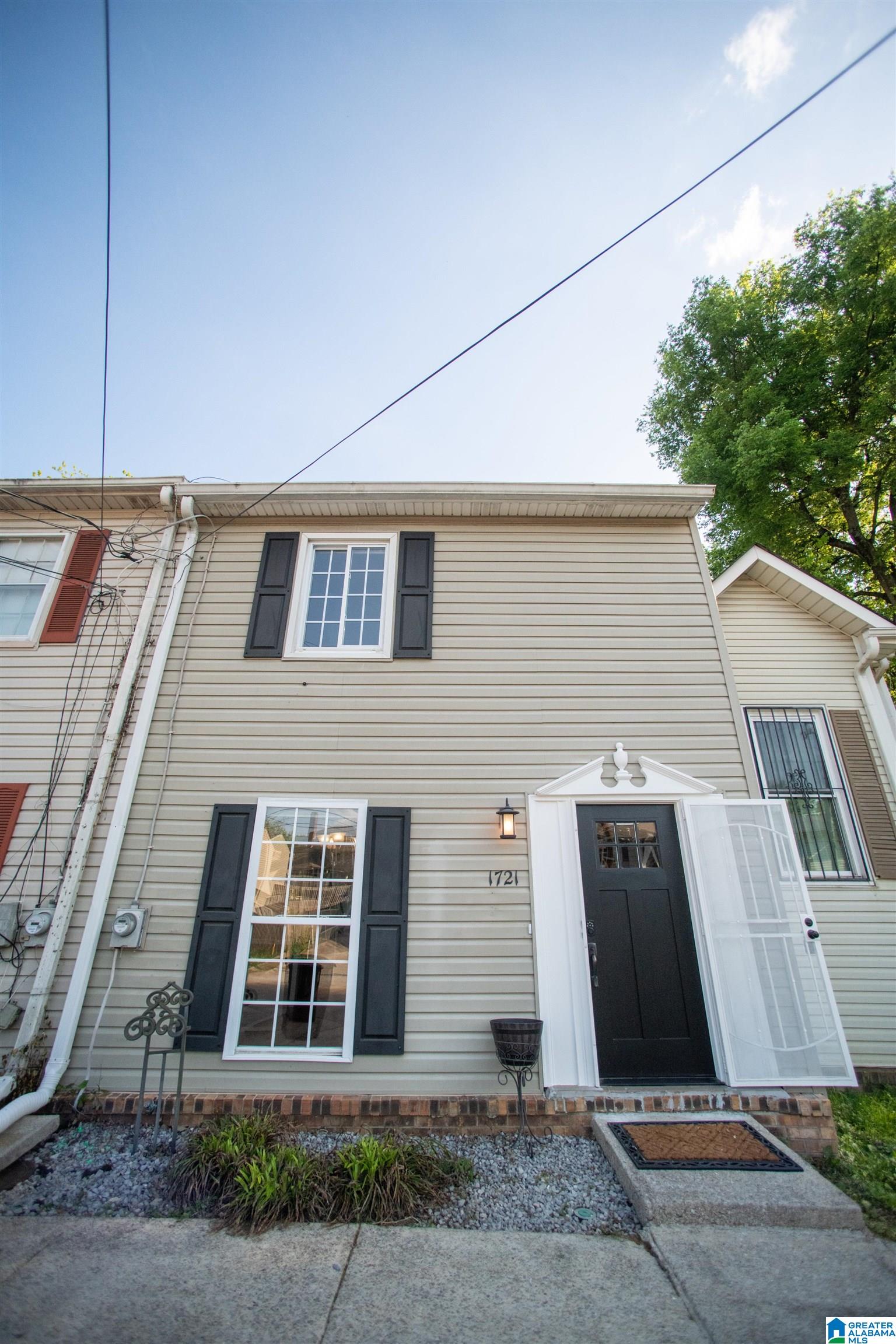JUST LISTED! Welcome to 1721 14th Terrace S. This spacious 2 bedroom, 1.5 bathroom townhome offers a fantastic mixture of quaint features as well as useful amenities! This home is perfectly located in Birmingham's historic Southside neighborhood which makes it walkable and bike-able to all of Birmingham's feature amenities including hospitals, university, event venues and luxury dining. Within the home, enjoy hardwood flooring, newly carpeted bedrooms, galley style kitchen, in-unit laundry and a private deck perfect for outdoor dining and 4th of July fireworks! Enjoy a full bathroom mutual to both bedrooms as well as a convenient half bathroom on the main floor perfect for entertaining guests.    Schedule your private showing today!