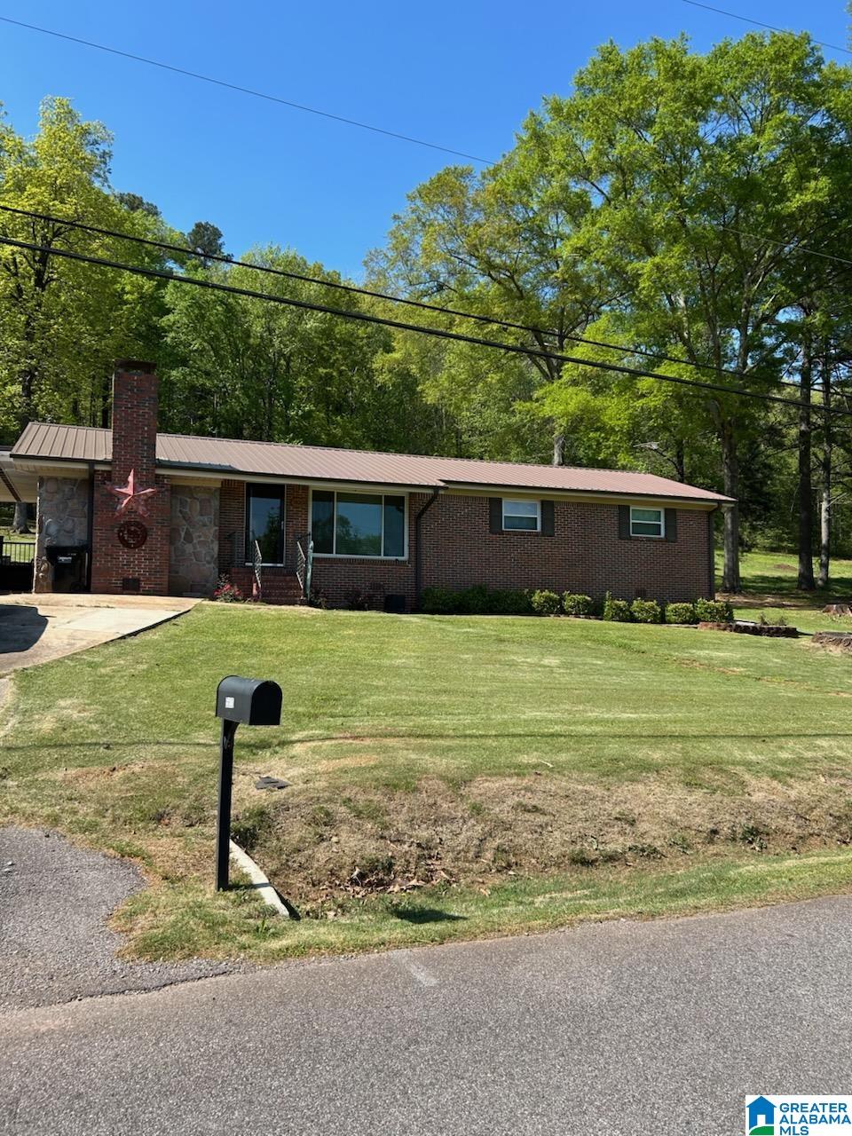 PRICED TO SELL!!!  3 bedroom, 2 bathroom home situated on over 4 acres. This well maintained property offers privacy and peaceful surroundings with a view of a pond from the front porch. Interior features include a shiplap ceiling that adds character and warmth to the space. Plenty of room to enjoy outdoor living while still having the comfort of a functional layout inside. A great opportunity for those looking for a space in  a quiet setting. Conveniently located just minutes from shopping and interstate travel.  Don't miss out on this one, with the charm it offers it won't last long!!