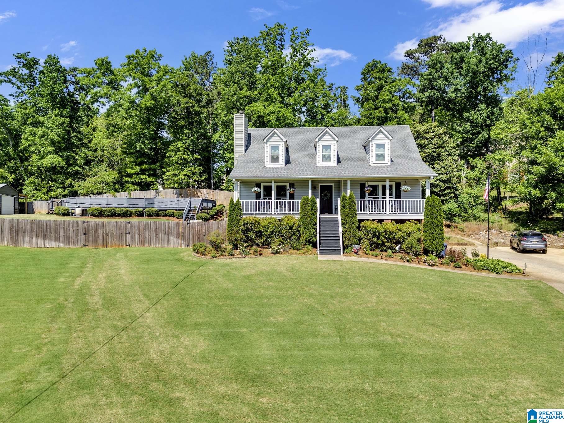 So much space in this 5 bedroom house with pool! Master bedroom on main level and the additional 4 bedrooms are upstairs. Huge kitchen with freshly painted cabinets, tons of countertop and cabinet space with island. Right of kitchen is formal dining room and a sunroom overlooking backyard and pool area. Dreamy garden with veggies and fruits. Plus an apple tree! Living room features a gas fireplace and so much natural light coming in! Large master bedroom with walk in closet, his and her sinks, garden tub, separate shower and private exterior door to a deck. Upstairs bedrooms all have walk-in closets and a jack & jill bathroom. Freshly painted most areas throughout. 30yr roof 2017, Exterior doors 2022, new windows 2022, Two new AC units & furnaces in 2018, Sprinkler system 2019, 30ft above ground pool with a 16X20 deck all around, 18X20 shop, 12X12 shed, chicken coop with electrical lines for heat, water warmers and fan, 26KW General whole home backup generator.