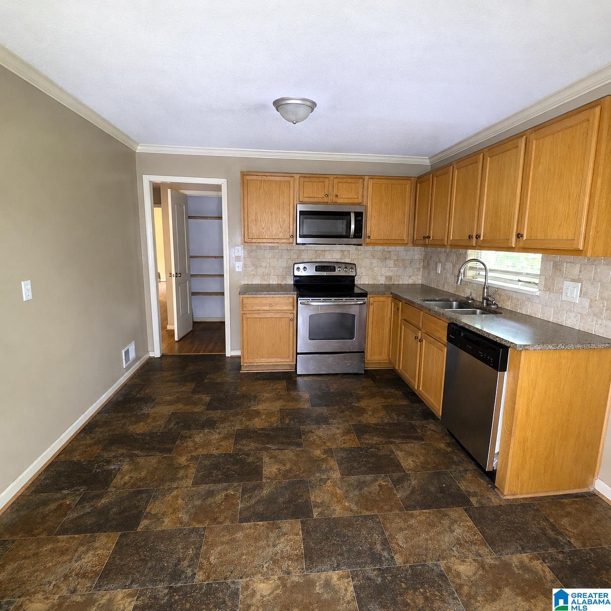 Photo 3 of Single family home for sale at 415 Gene Reed Dr, Birmingham, AL 35215 | MLS# 21455919 | Listing updated on 2026-07-16