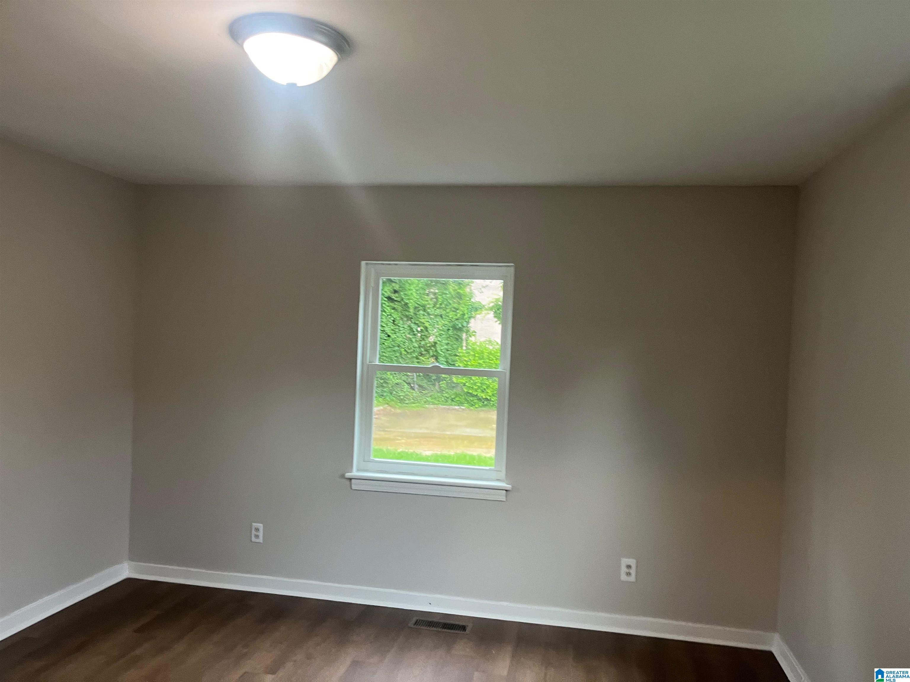 Photo 4 of Single family home for sale at 1400 19th Place SW, Birmingham, AL 35211 | MLS# 21459521 | Listing updated on 2026-07-30