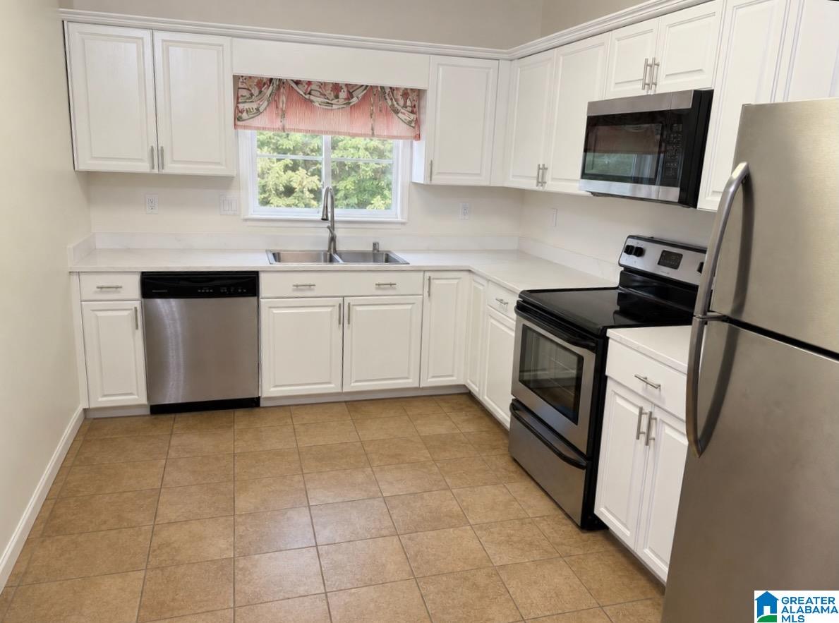 Photo 3 of Single family home for sale at 825 Rockford Ln, Birmingham, AL 35209 | MLS# 21460005 | Listing updated on 2026-09-14