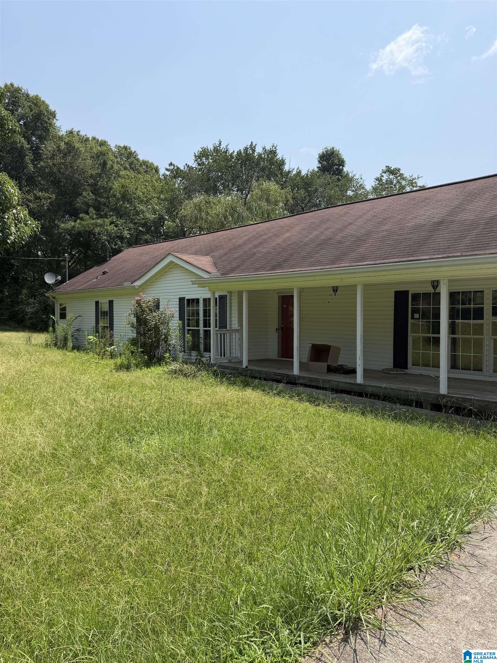 1st image of 215 Tidwell Dr, Oneonta, AL 35121 | MLS# 21460647
