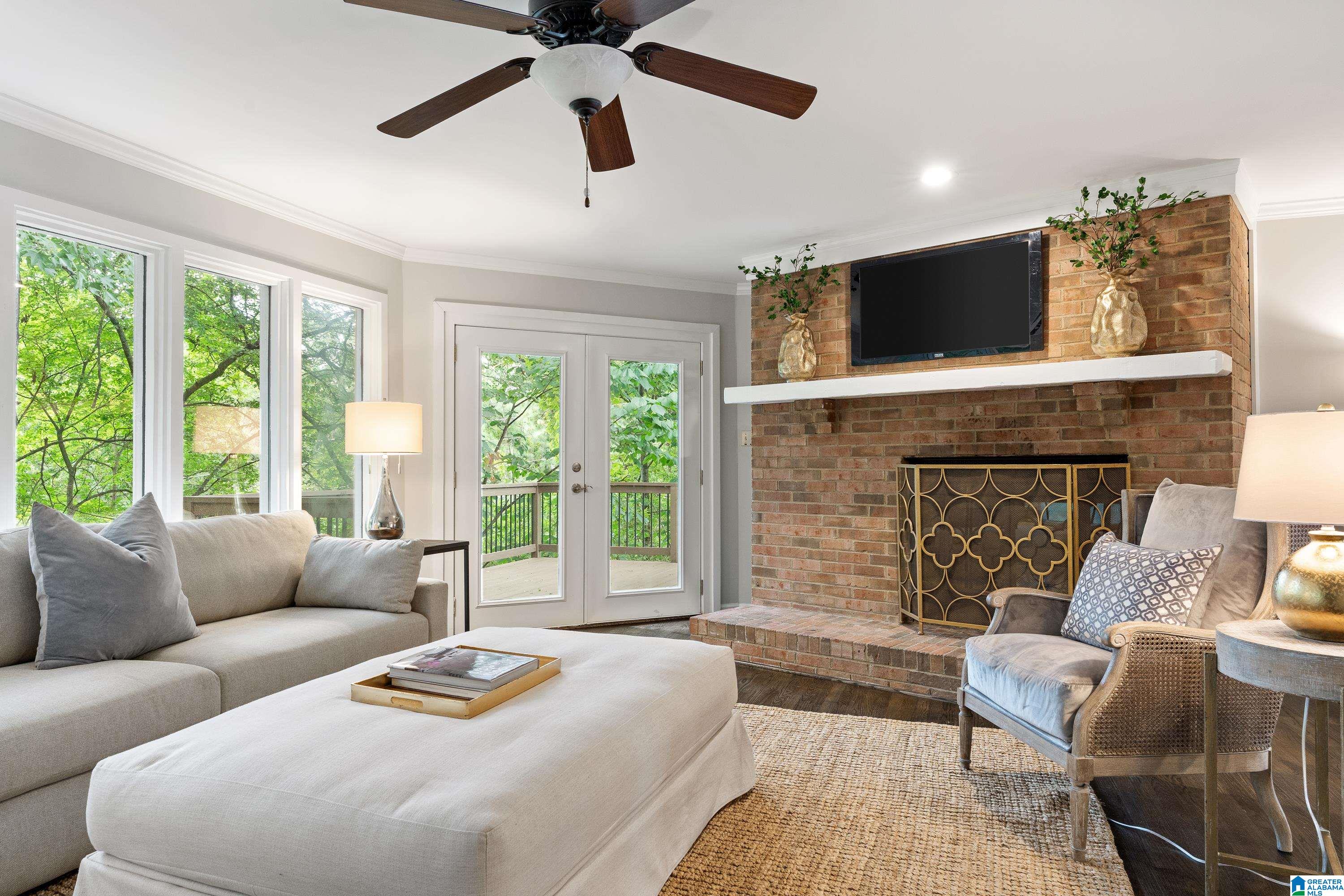 Tucked away on a quiet cul-de-sac street just off of Cahaba Valley Road and zoned for Spain Park, this custom-Built split-bedroom home offers privacy, convenience, and beautiful treehouse views. Rich hardwoods span the main-level living, dining, and bedrooms. The spacious kitchen is a place where you'll want to spend a lot of time. Anchored by a large butcher block island with brick surrounded cooktop on one side, glass front cabinets and desk, on the other, and then along the front of the home, the most charming café table nook that overlooks a pea gravel walkway with a courtyard feel. Ultimately it all opens to the dining area and family room. The primary suite boasts a freshly remodeled bathroom with double vanities, HUGE custom shower, walk-in closet, and private deck access. A second deck is accessible from both the family room and rear secondary bedroom. Full basement, 2-car garage, newer roof, and a setting you’ll love. It just doesn't get any better than this.