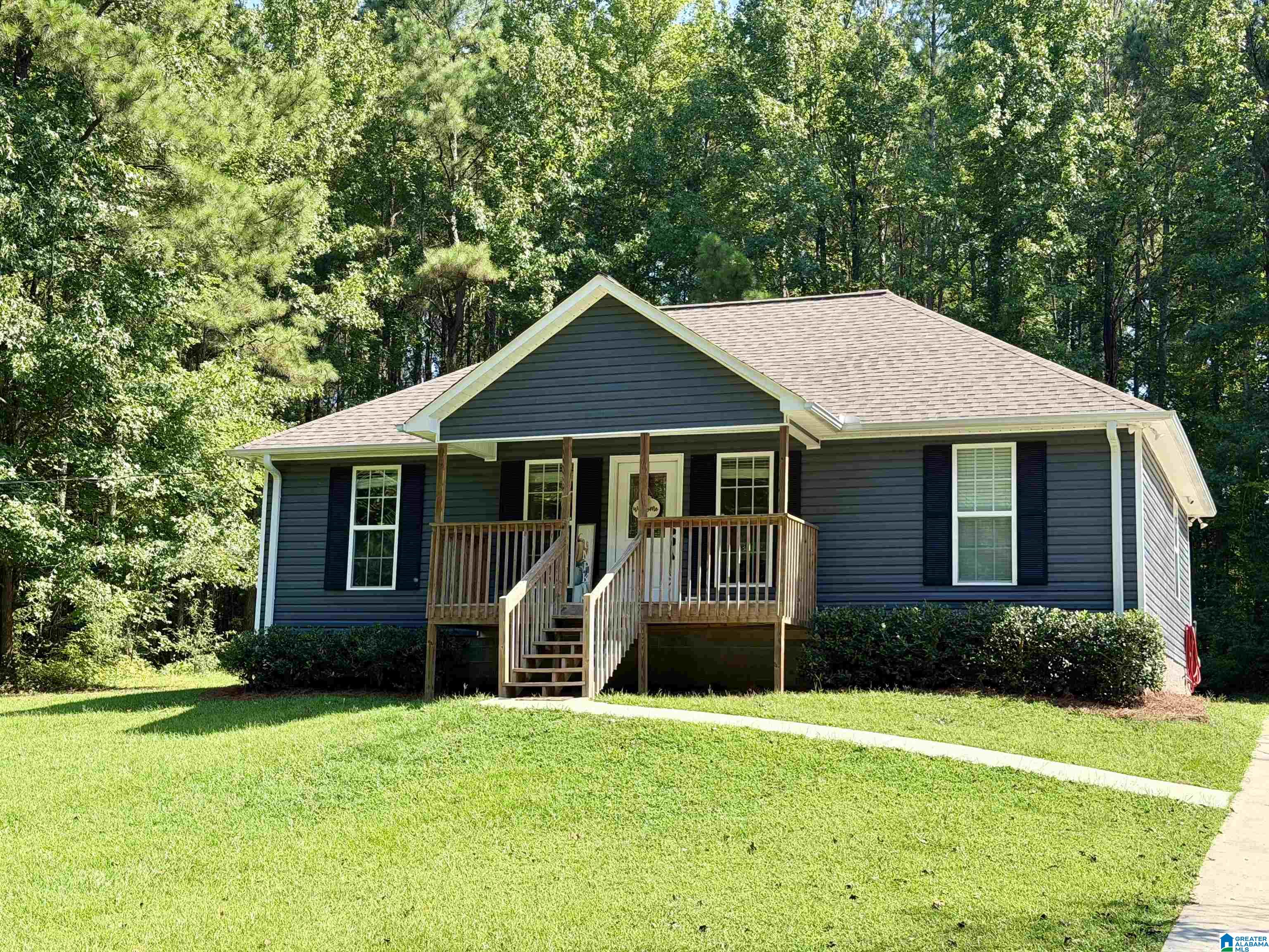 Built in '22, this home offers the newer construction you want with the comfortable, easy-living floor plan. You're welcomed by a spacious Great Room with a vaulted ceiling giving the heart of the home an open, airy feel. The kitchen & dining area makes everyday living simple while creating an inviting space for entertaining. The split-bedroom floor plan provides privacy for the Primary Suite. Here, you'll find an ensuite bath with beautiful vanity, oversized tiled floor & a generous walk-in closet with room to stay organized. Outside, there's even more space to enjoy your morning on the front porch or on the open rear deck—perfect for grilling, relaxing, or enjoying the outdoors. On 0.4 acre, the homesite provides room to breathe without demanding an entire weekend of upkeep. When it's time to head out, convenience is another standout feature.  A 5 minute drive to I 65 makes commuting & access to surrounding area easy. Come experience Hayden living & imagine making this one your own.
