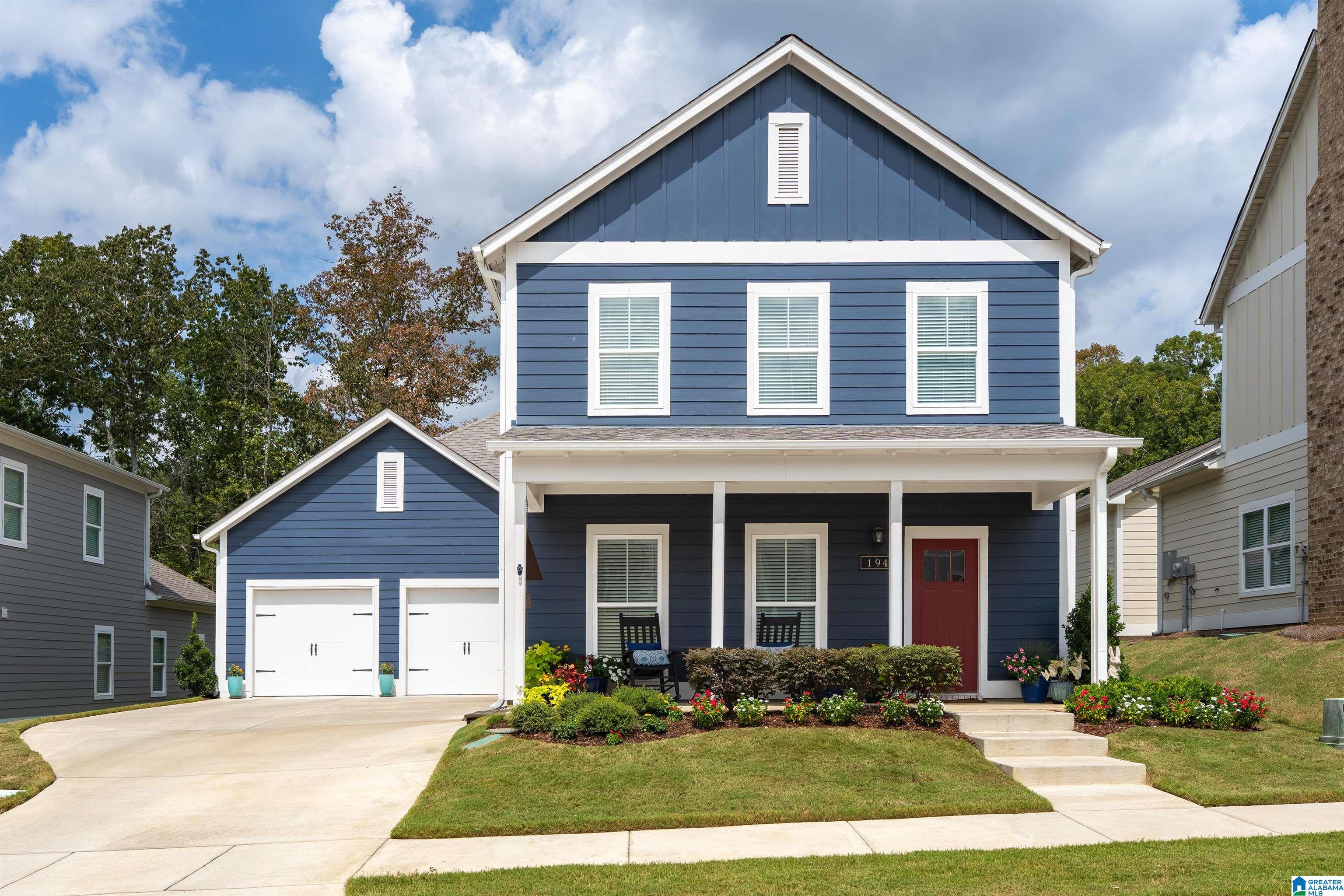 Refreshingly Distinctive in Helena! You'll be intrigued by the charm of the finishes and the intentional details that make this 5-bedroom, 4-bath house feel like a real HOME. It's classic; NOT BORING. And when you step onto the covered back patio and take in that view, you'll want to stay. Such character with sophisticated paint choices and wainscoting from the moment you step inside. TWO bedrooms on the main level on opposite ends of the house make this home so easy to live. Open floor plan has large kitchen with a big working island, granite counters, tile backsplash, stainless appliances, and elevated lighting. No wire shelving in the pantry; all wood. Gas fireplace adds that touch of warmth in the living area. Primary suite has all the right things; soaking tub separate shower, dual vanities, and large walk in closets. You'll spend all your time on the back covered patio enjoying the view. Get your pintrest board ready because front porch decorating is in your future!