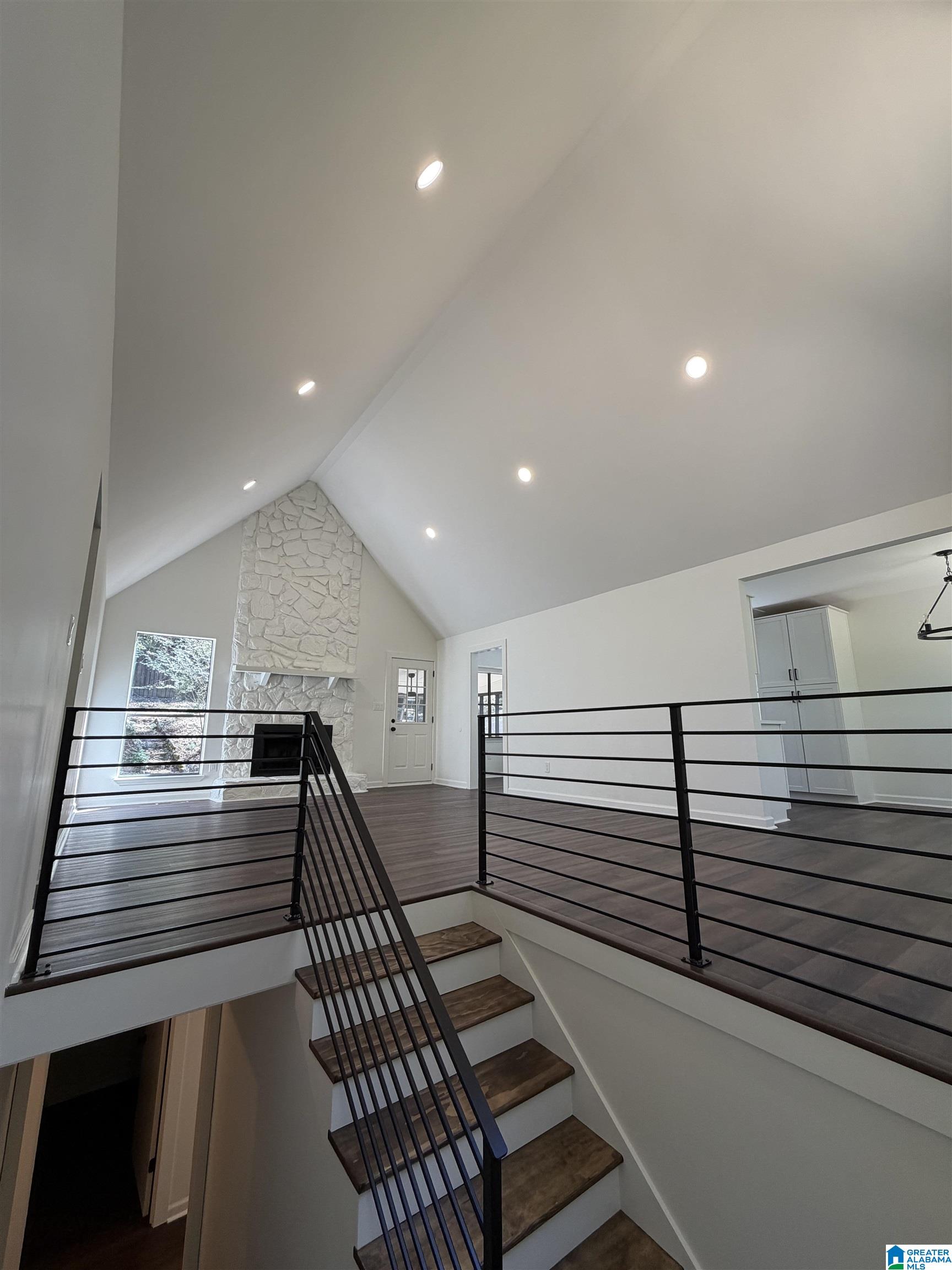 An incredible opportunity to own in Trussville City Schools! This fully renovated 4 bedroom, 2 bath home offers space, style, and peace of mind with modern updates inside and out. Step inside to an open, light-filled living area featuring vaulted ceilings, sleek horizontal iron railings, and a statement floor-to-ceiling painted stone fireplace. The brand-new kitchen is ready for family dinners and entertaining, equipped with crisp brand new white cabinetry, stainless appliances, and an easy flow straight into the dining area. Both full bathrooms have been completely remodeled with stylish fixtures and finishes. With fresh interior and exterior paint, recessed lighting, and four full bedrooms providing flexible room for guests, hobbies, or a home office, you can move right in and start enjoying the Trussville lifestyle. Schedule your showing today! Minutes to entertainment district, shopping and schools!