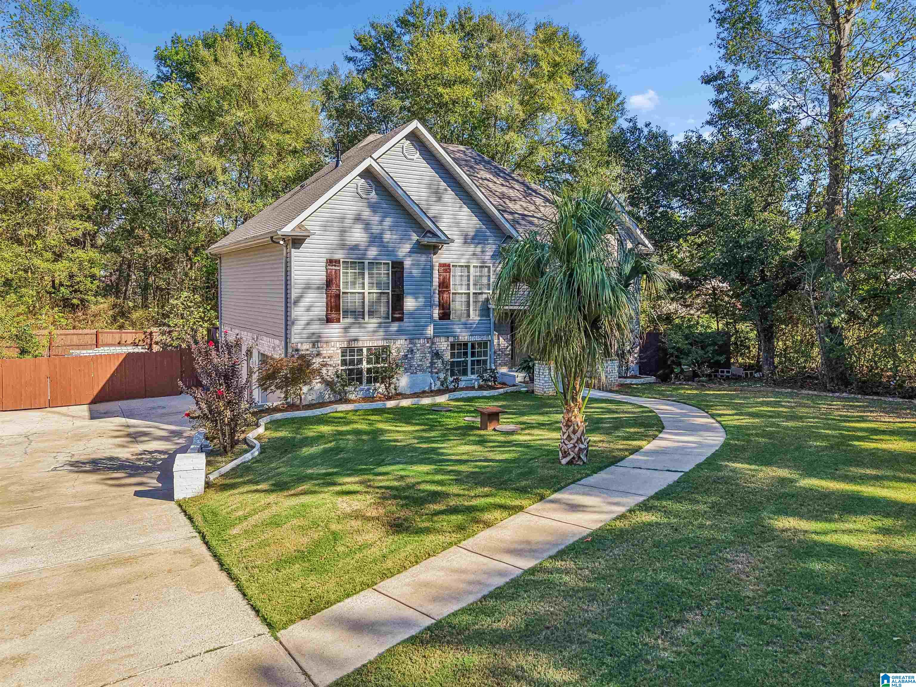 Welcome home to this move-in ready 5 bedroom, 3 bathroom home in the Stagecoach Trace community! The main level boasts gorgeous hardwood floors, natural light, and eye-catching vaulted ceilings. The inviting living room centers around a cozy gas log fireplace perfect for entertaining, along with the dining room and eat-in kitchen which is fully equipped with stainless steel appliances. The master suite features a relaxing jetted garden tub and a separate shower. The additional two main level bedrooms share an updated bath with a standing shower. Downstairs, the beautifully finished basement adds versatility with two additional rooms and a third full bath. This space is perfect for a home office, gym, or guest suite. Enjoy outdoor living on the large screened back deck and covered patio overlooking the fenced yard. Complete with a two-car garage, this property offers fantastic neighborhood amenities, including a community pool, clubhouse, walking trails, and sidewalks.