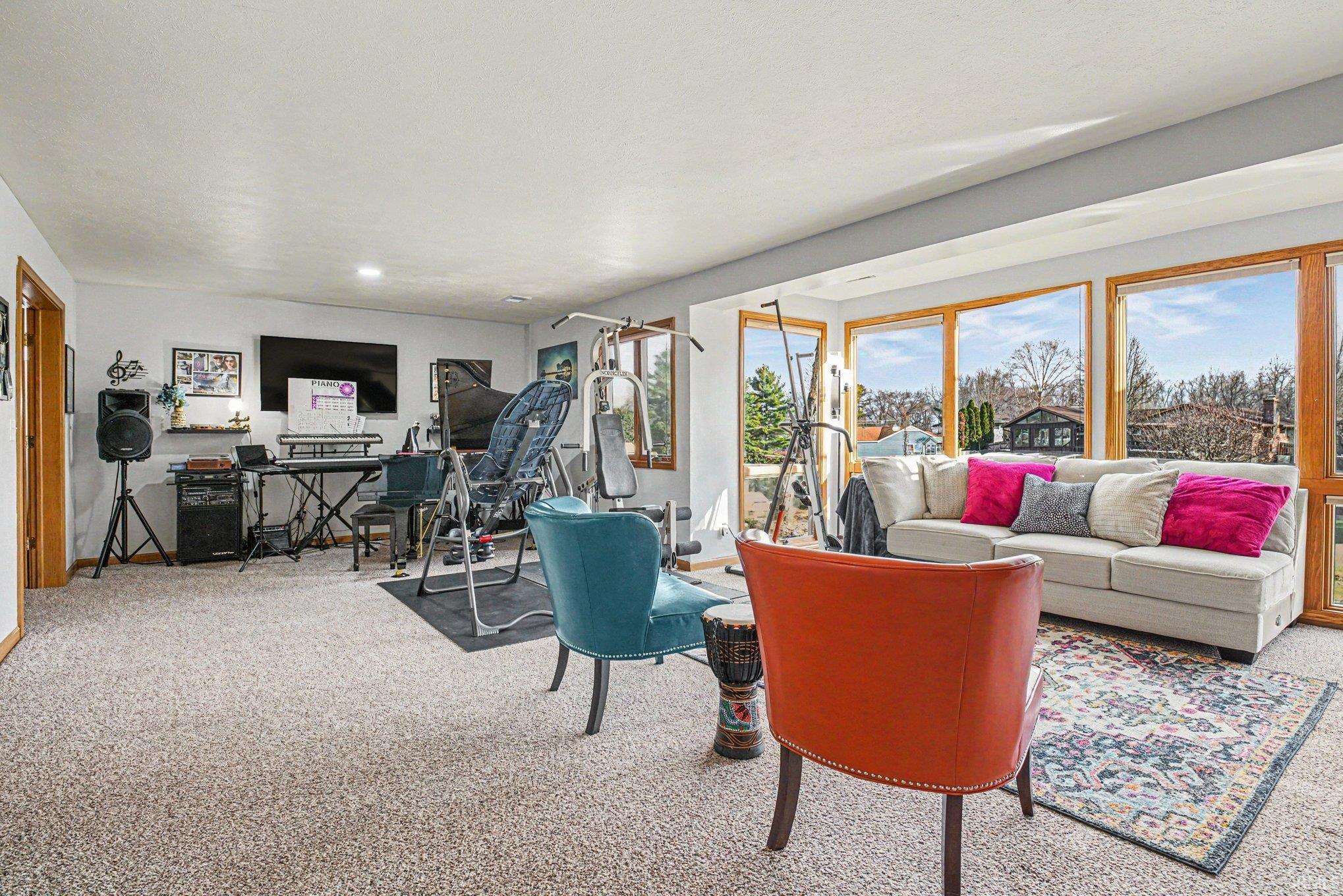 Lower Level Wall of Windows Overlook the River