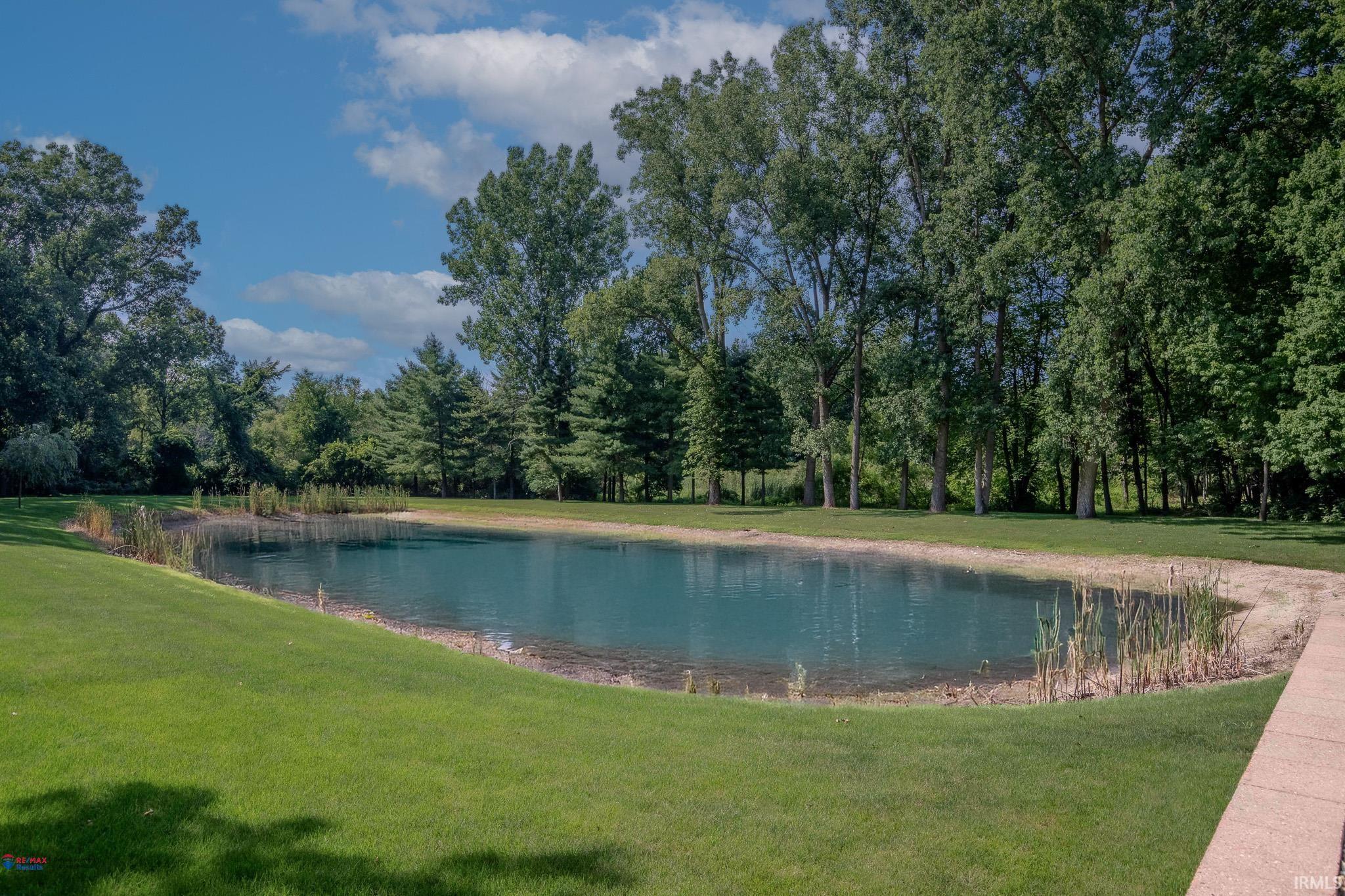 1/2 Acre + Pond, full stocked w/many varieties of fish & 2 Aerator pumps.