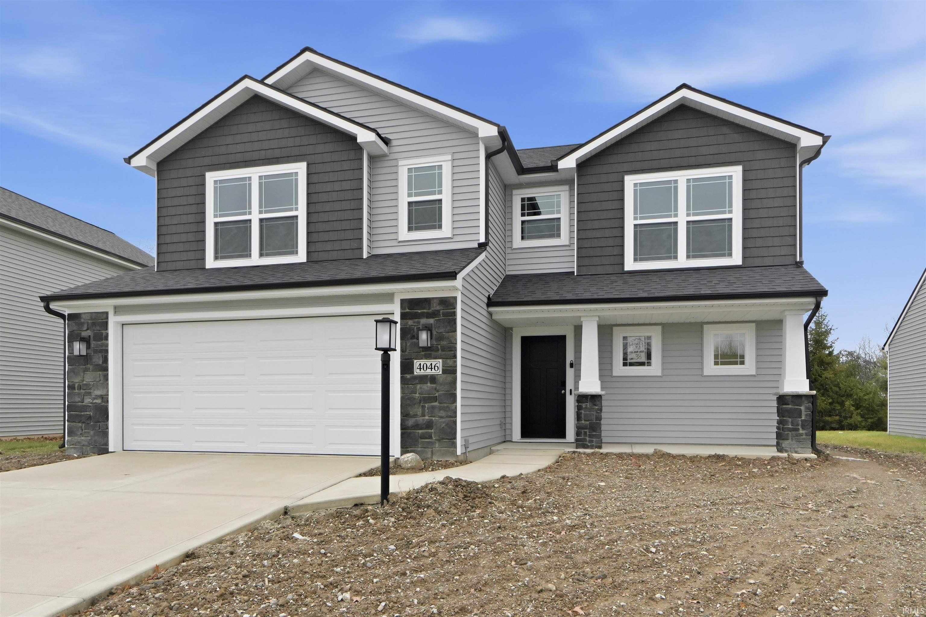 Craftsman house with stone siding, an attached garage, driveway, a porch, and roof with shingles